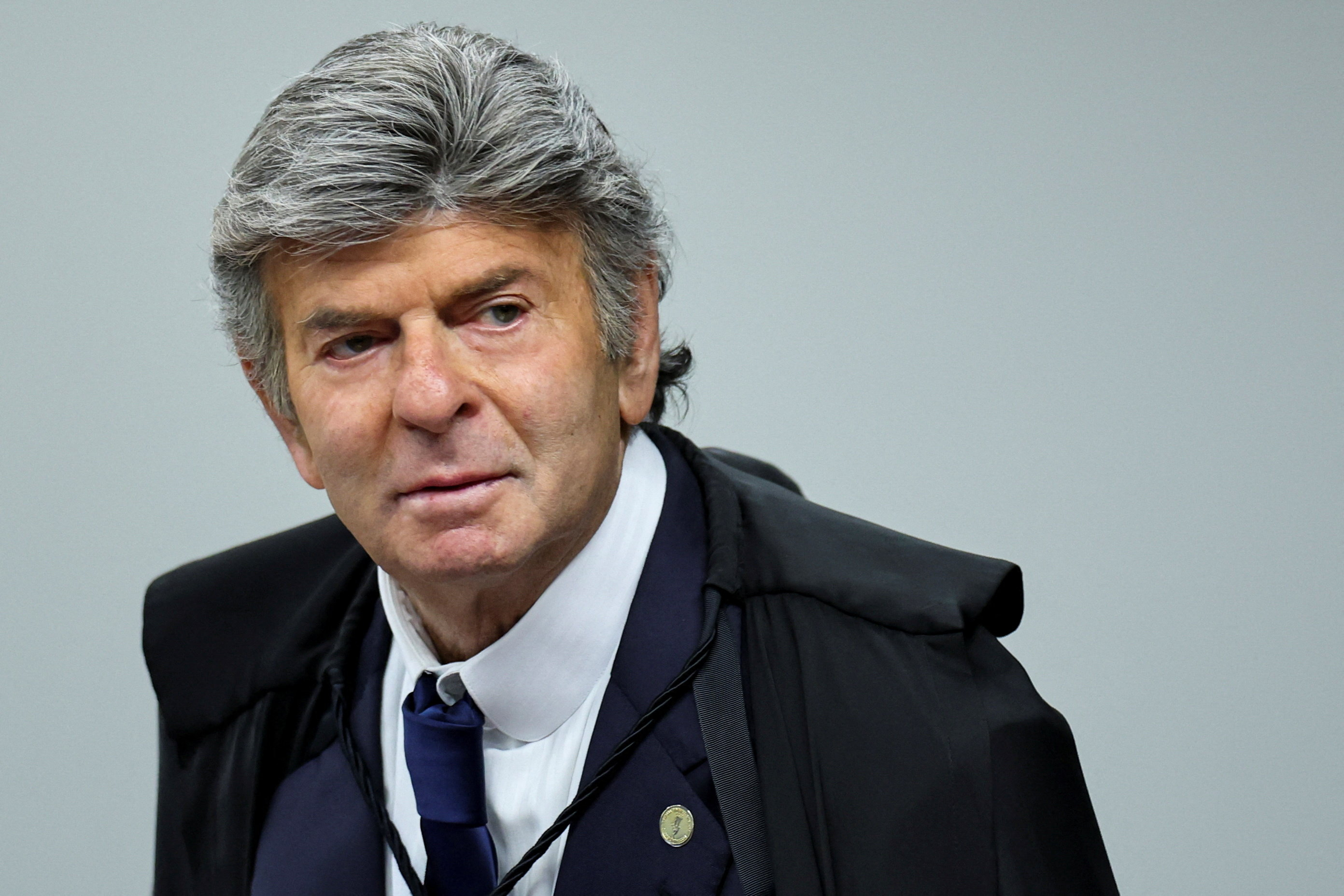 Brazil's Supreme Court Justice Luiz Fux attends a session during the final phase of the trial of Brazil's former President Jair Bolsonaro, on charges of plotting a coup to overturn the 2022 election, in Brasilia, Brazil, September 10, 2025. [Adriano Machado/Reuters]