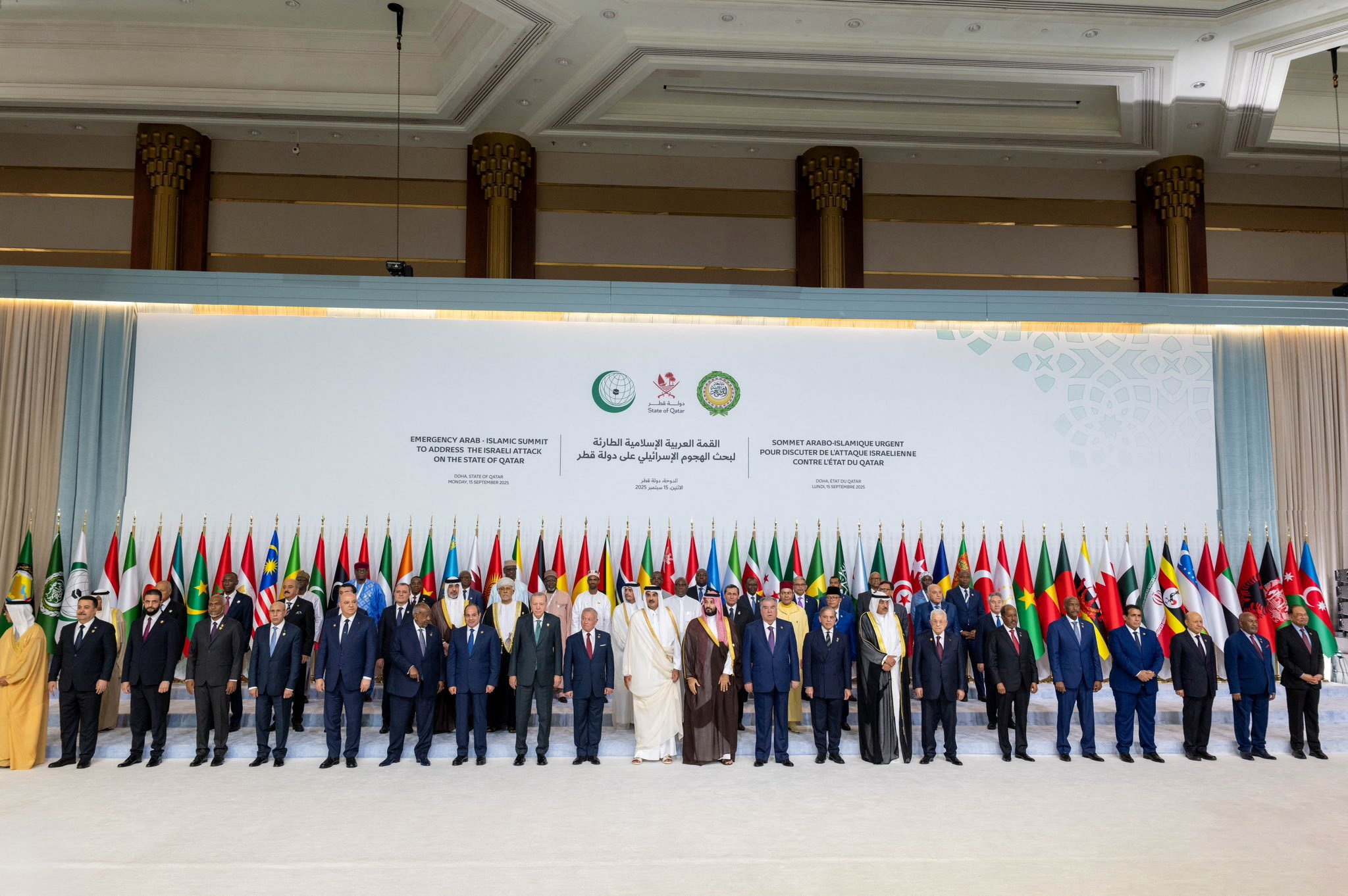 Attendees of the emergency Arab-Islamic leaders' summit to discuss the Israeli attack on Hamas on Qatari territory, pose for a family photo, in Doha on September 15, 2025. [Handout/Qatar News Agency via Reuters]