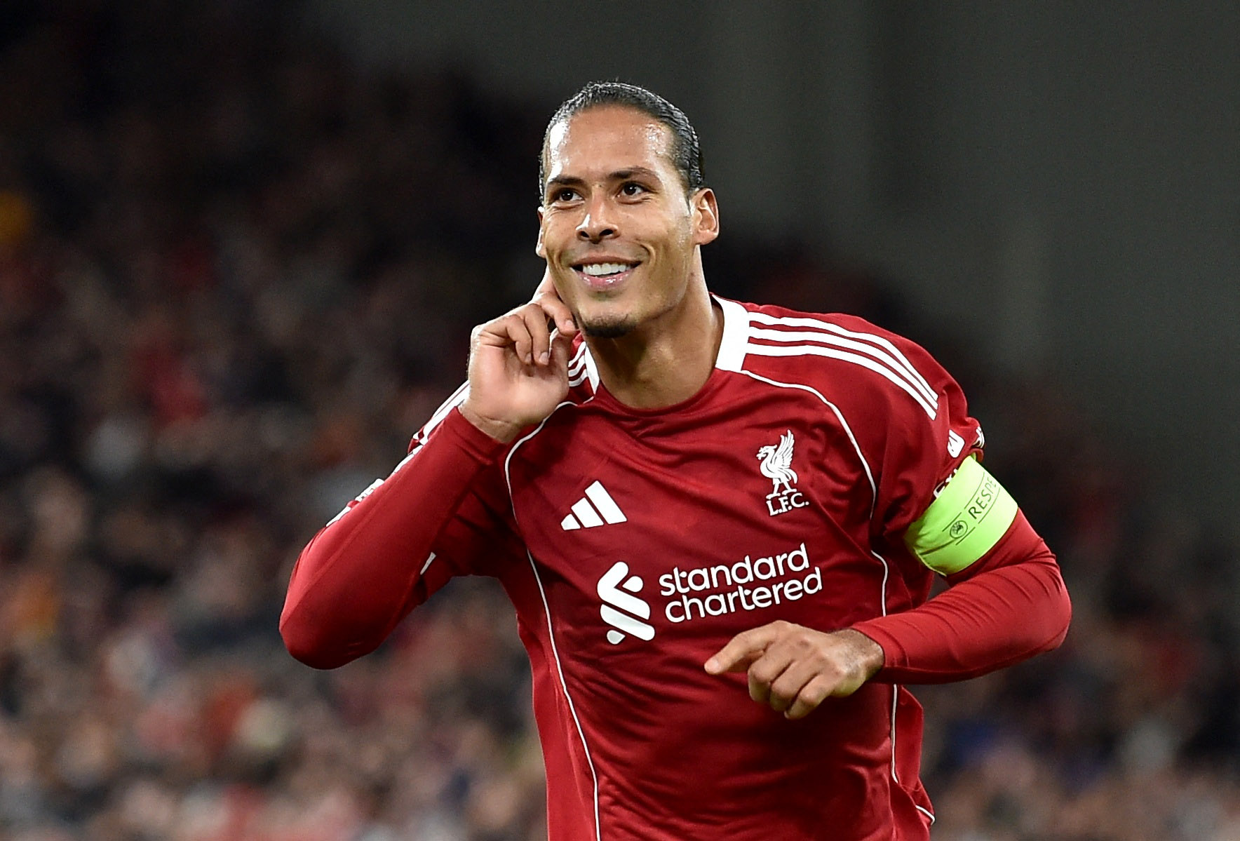 Liverpool's Virgil van Dijk celebrates scoring their third goal