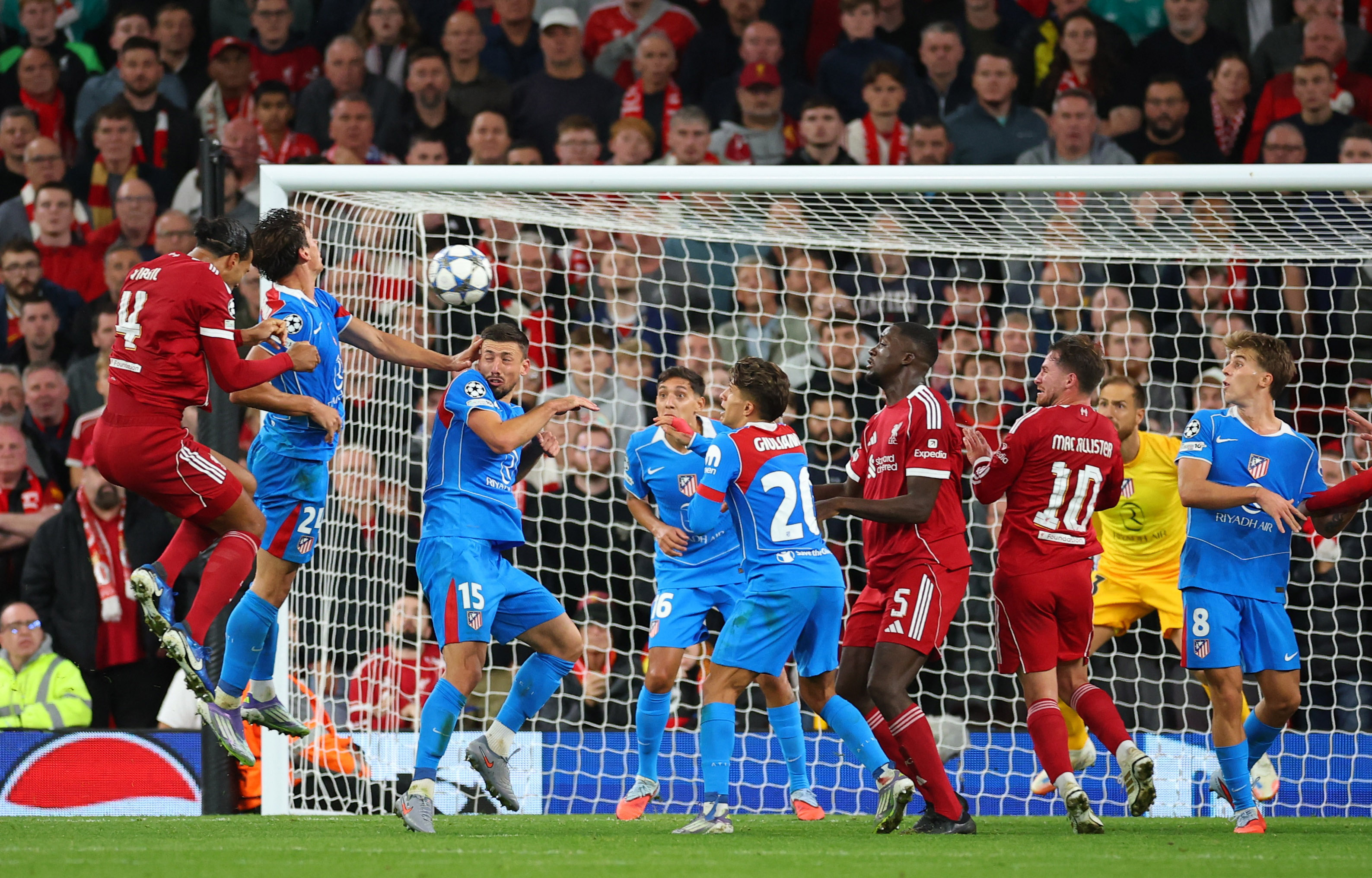 Liverpool's Virgil van Dijk scores their third goal