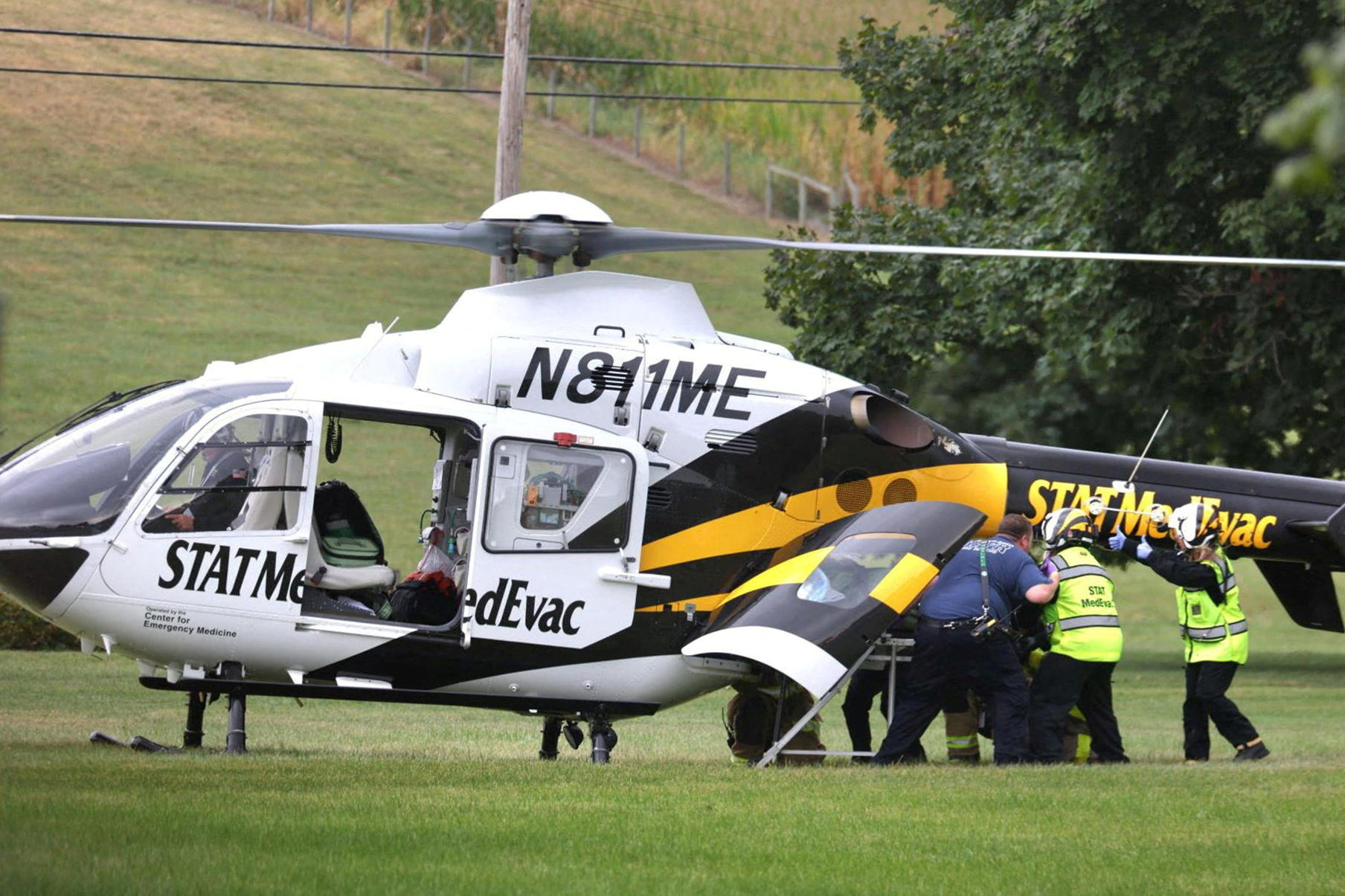 A police officer is loaded into a Medevac