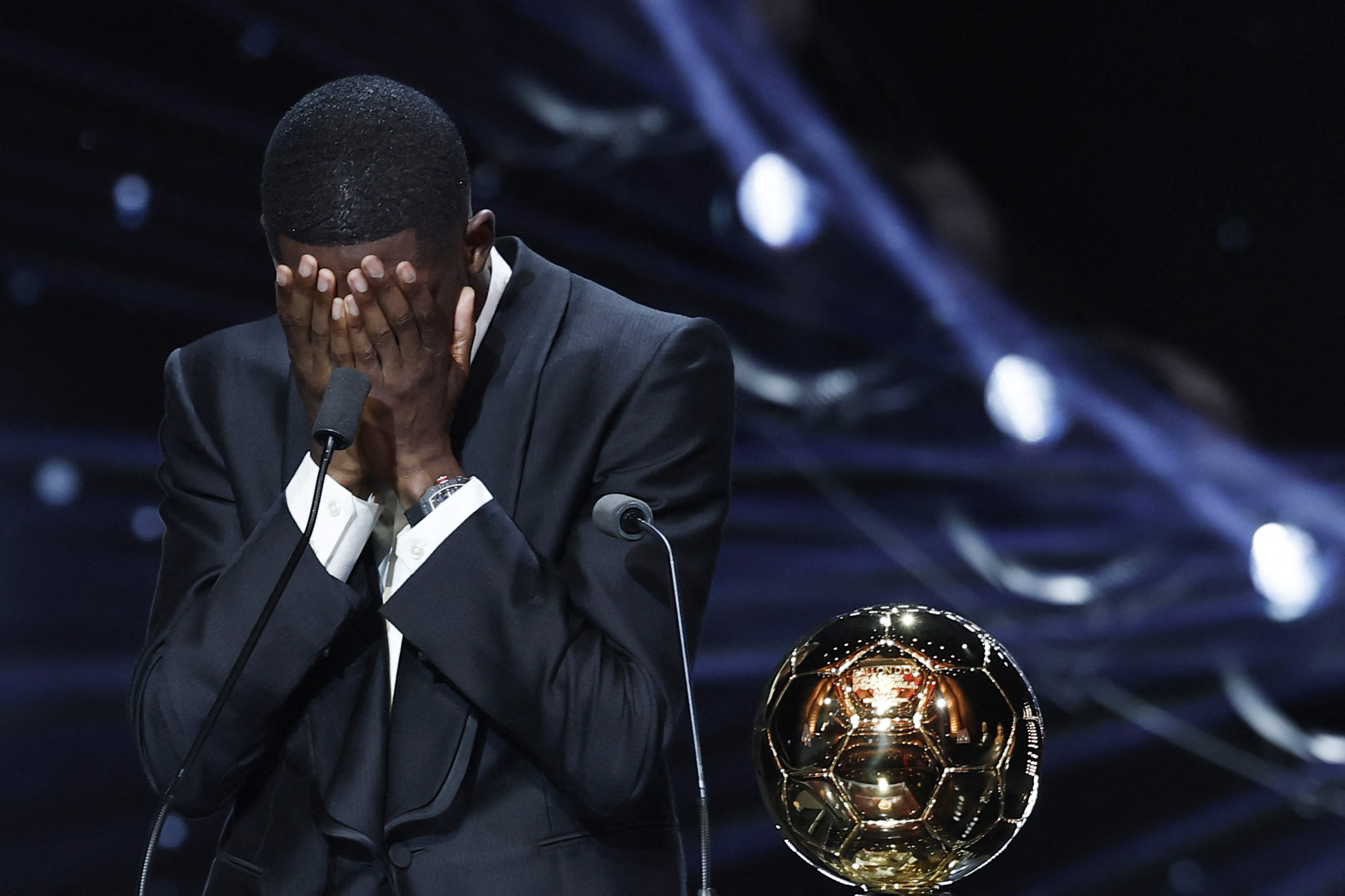 Paris Saint-Germain's Ousmane Dembele celebrates after winning the men's Ballon d'Or award