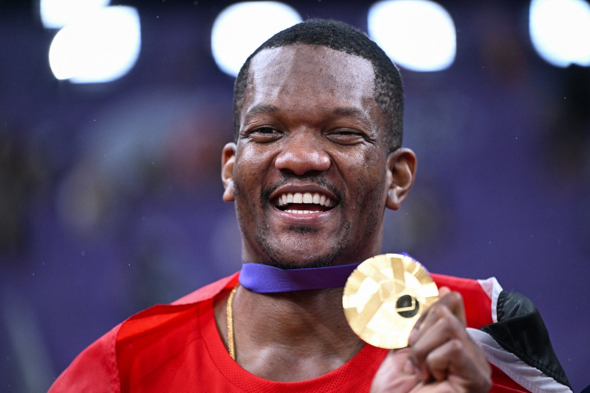 Gold medallist Trinidad and Tobago's athlete Keshorn Walcott poses with his medal after the men's javelin throw final during the World Athletics Championships in Tokyo