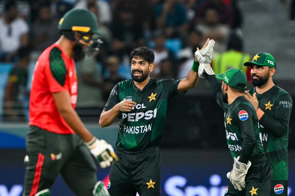 Pakistan's Haris Rauf, centre, celebrates after dismissing Bangladesh's Tanzim Hasan Sakib during the Asia Cup 2025 Super Four Twenty20 international cricket match
