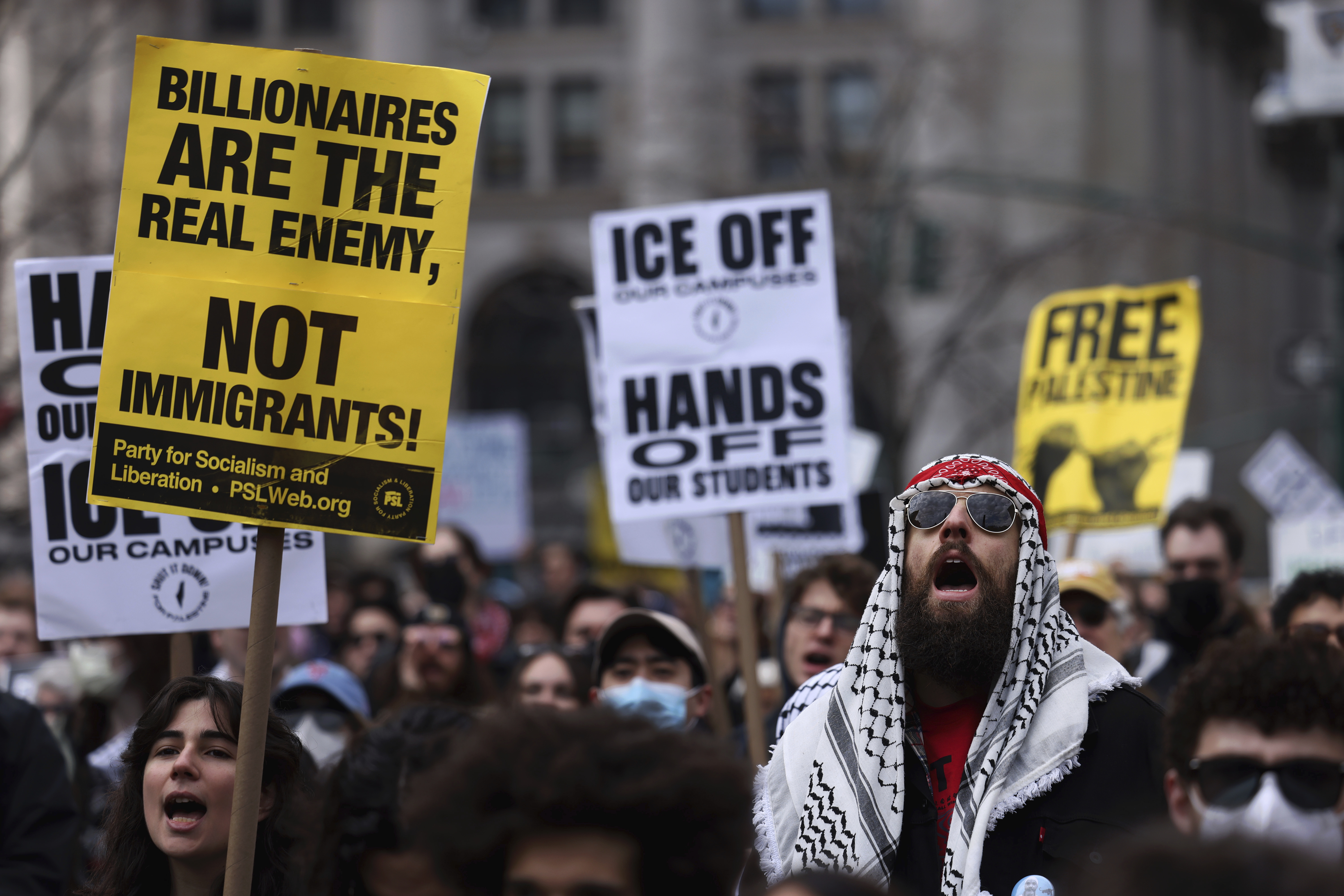 Protesters rally in support of detained Palestinian activist Mahmoud Khalil.