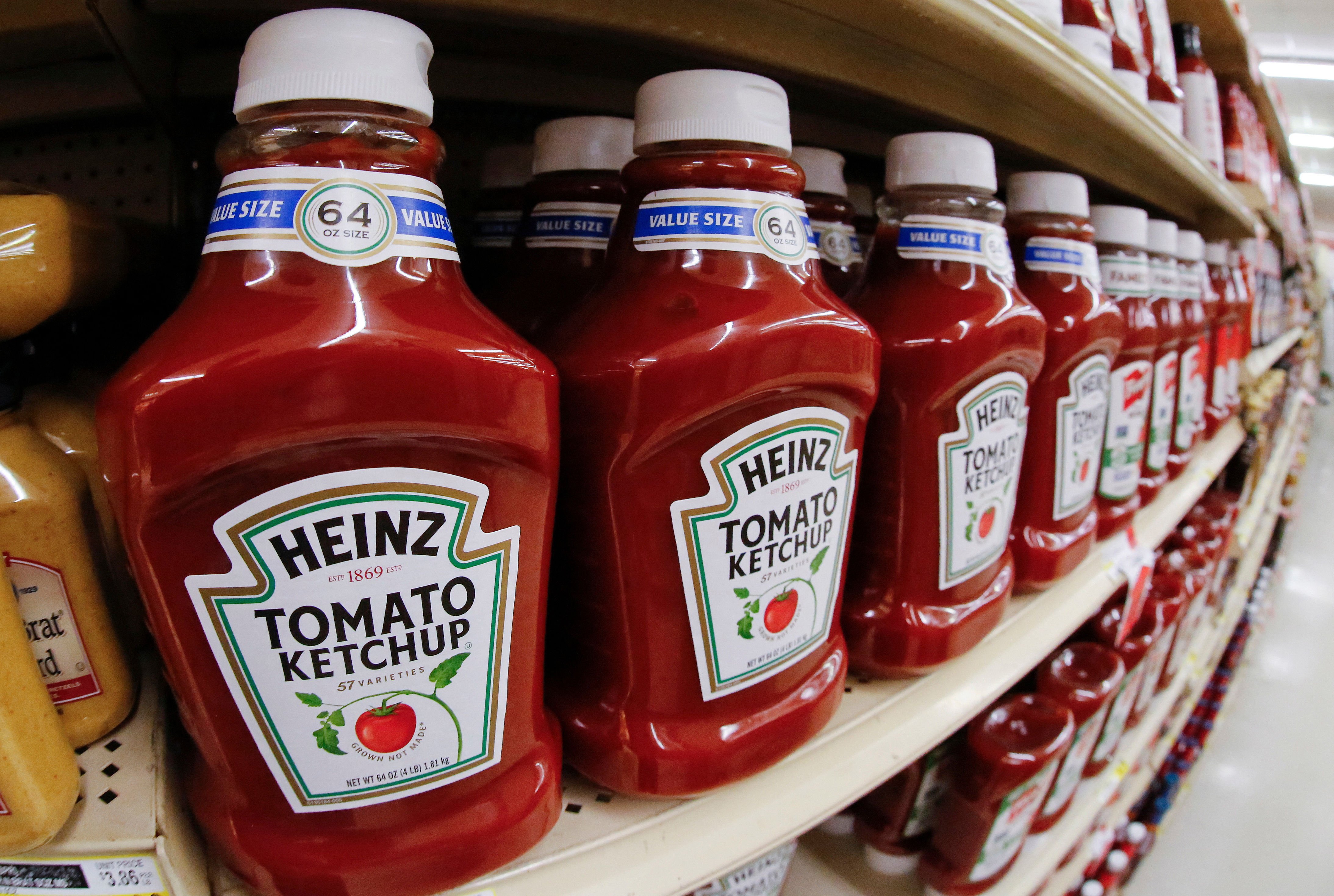 FILE- This Feb. 21, 2018, file photo shows a display of Heinz Ketchup on display in a market in Pittsburgh. (AP Photo/Gene J. Puskar, File)