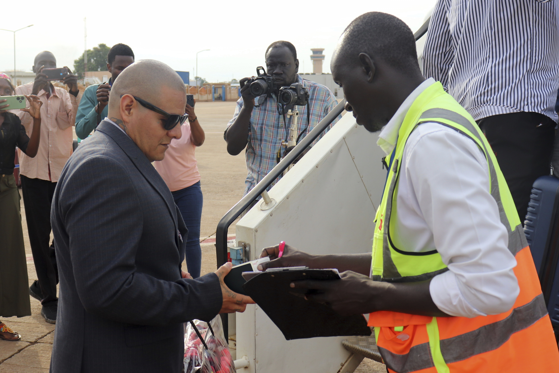 Jesus Munoz Gutierrez, a Mexican migrant deported months ago to South Sudan by the United States under an immigration crackdown, is repatriated to his home country at Juba Airport in South Sudan, Saturday