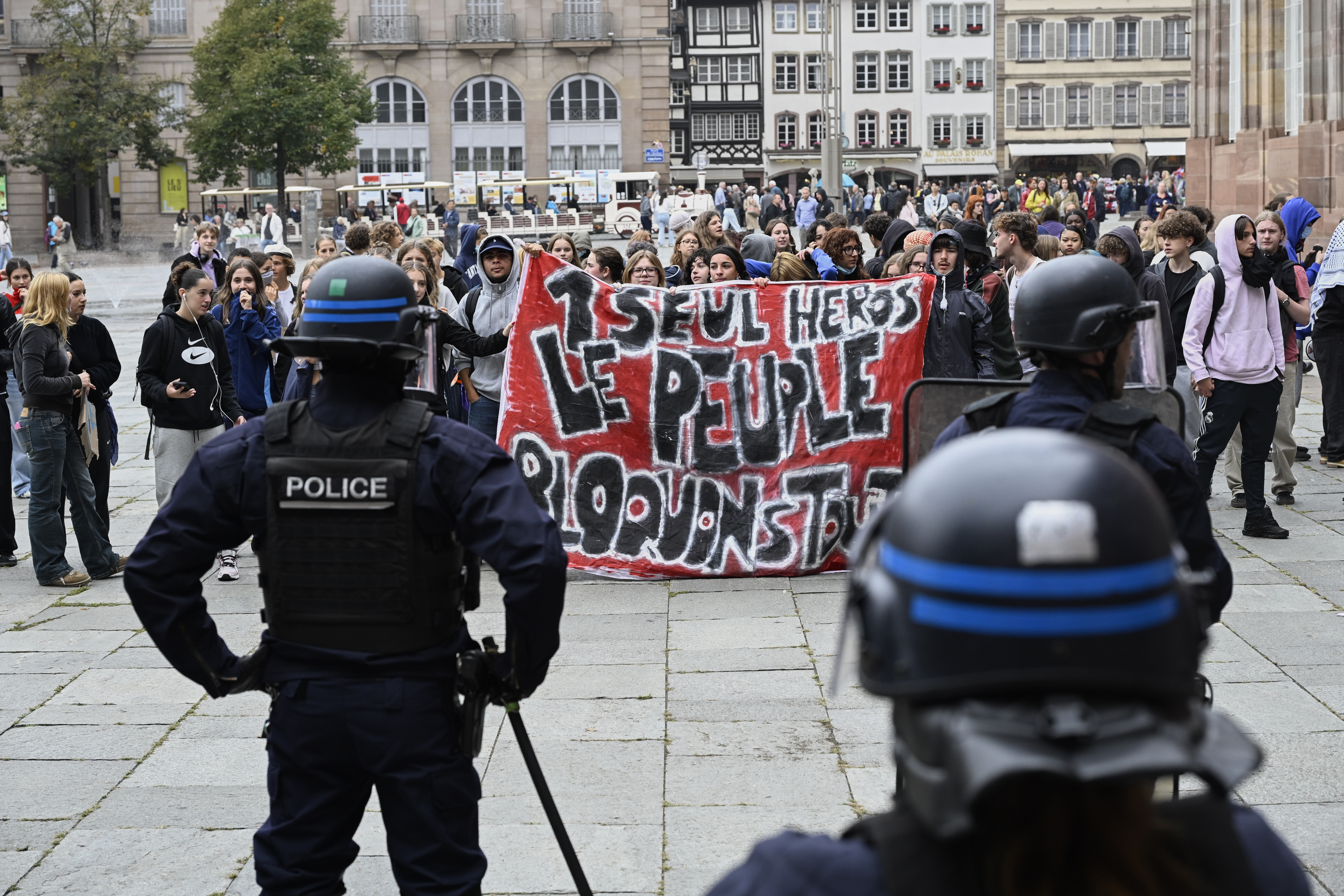 France's streets ablaze as anti-government protests paralyze daily life