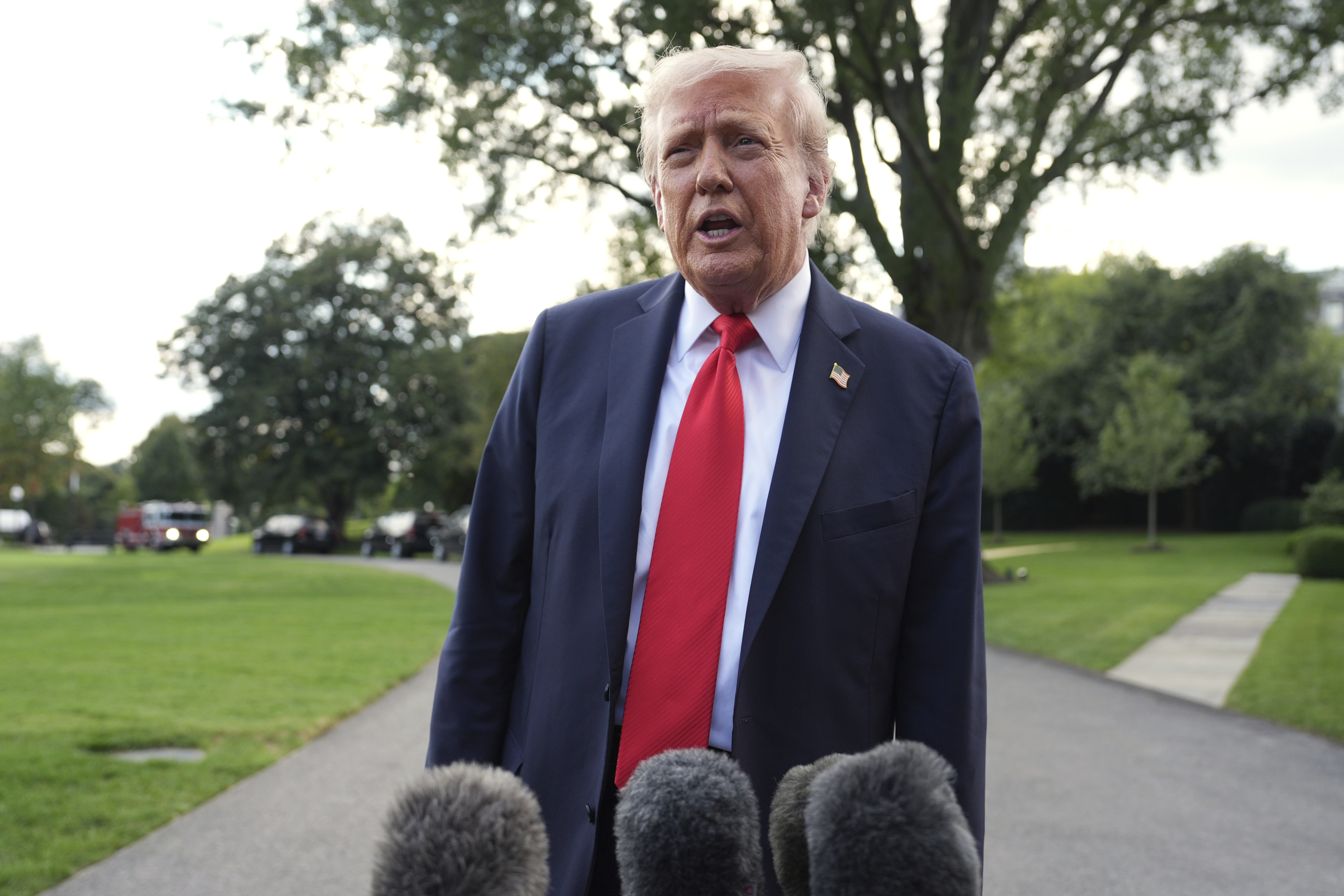 US President Donald Trump speaks with reporters before boarding Marine One on the South Lawn of the White House, Washington on September 11, 2025.