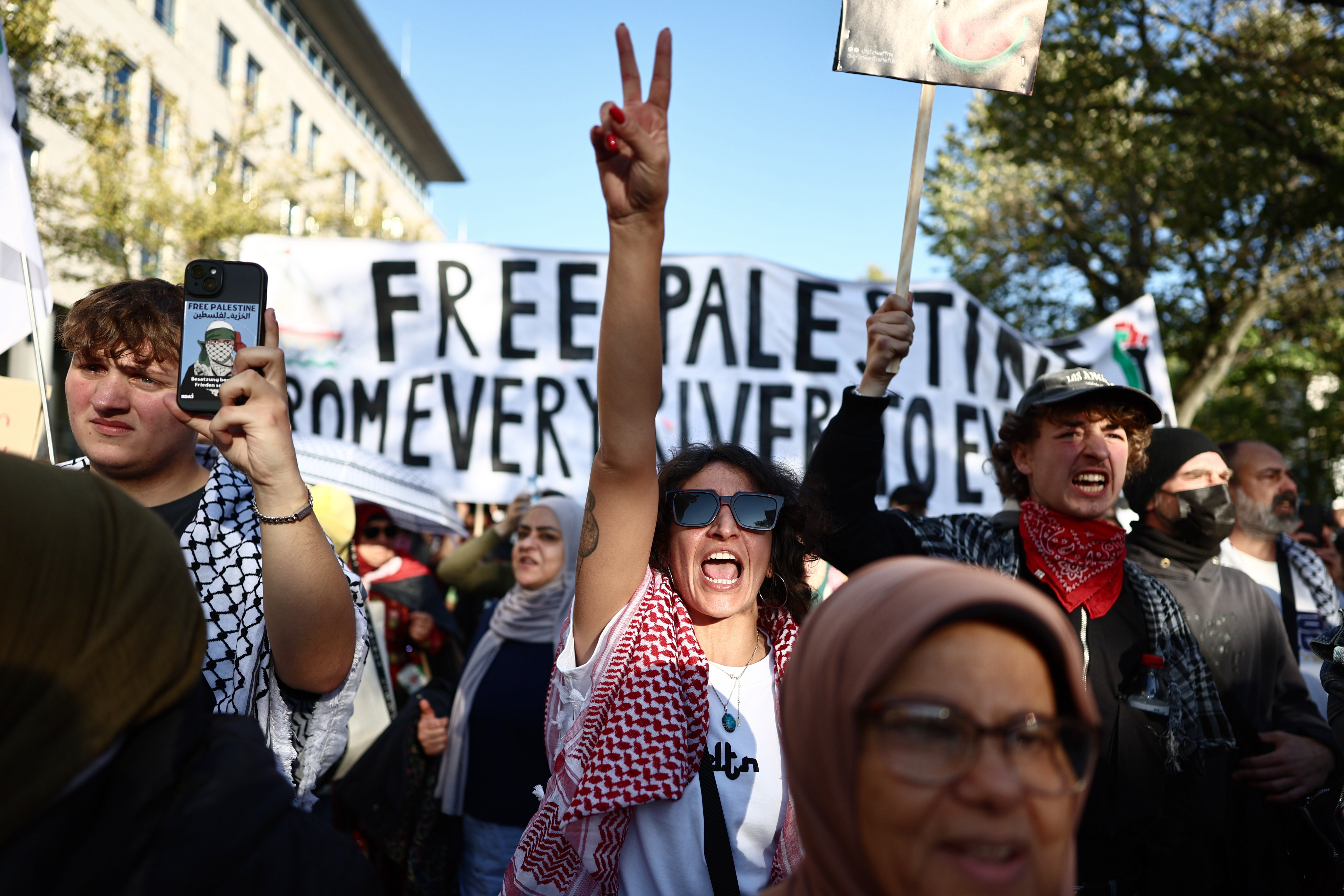 People protest against Israel during a mass demonstration in Berlin.
