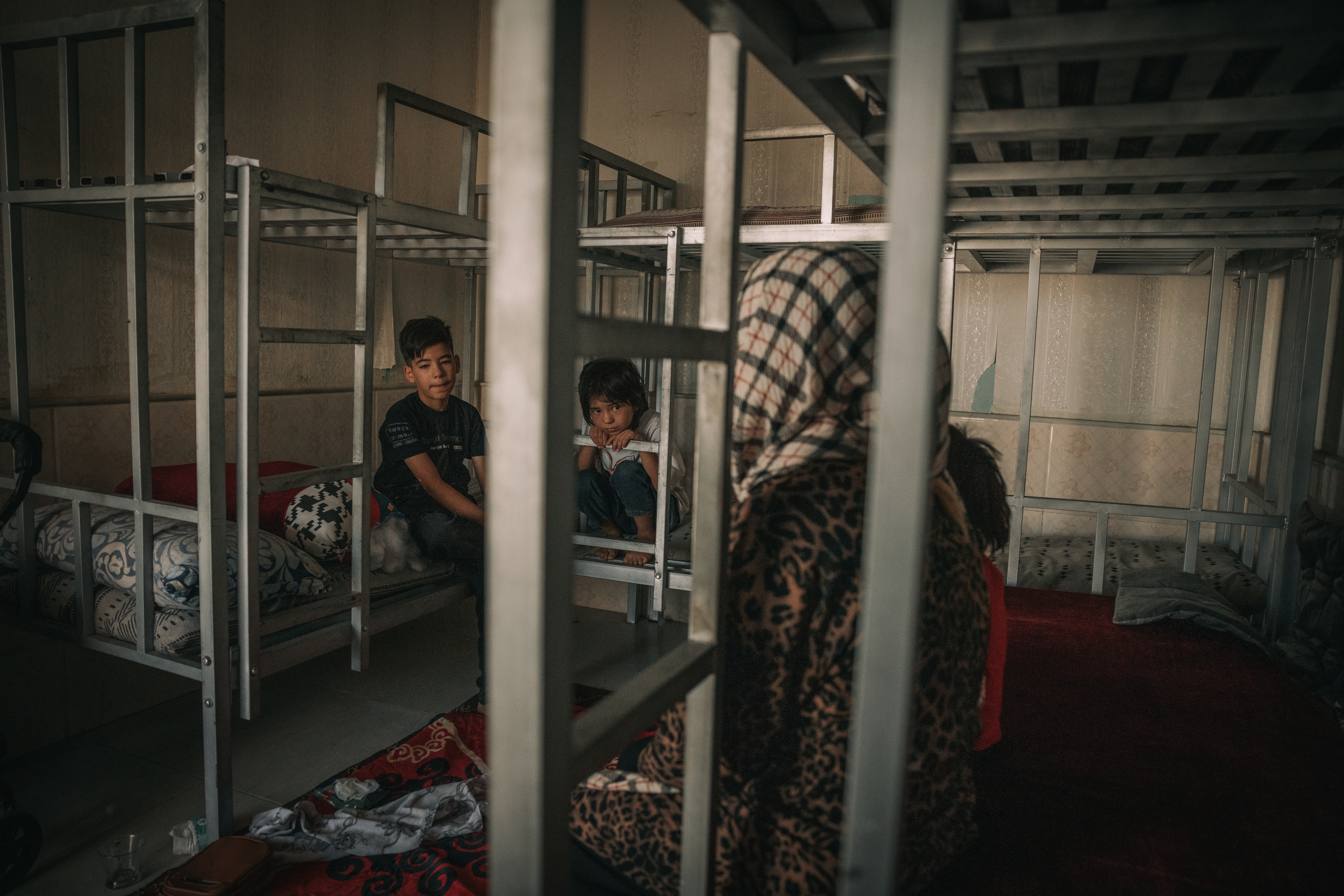 Zainab, 30, once worked in Iranian greenhouses but could not enroll her children in school there. “All we want is a place to live and work, so our children can finally have a future,” she says. Photo: IOM 2025/Mohammad Osman Azizi