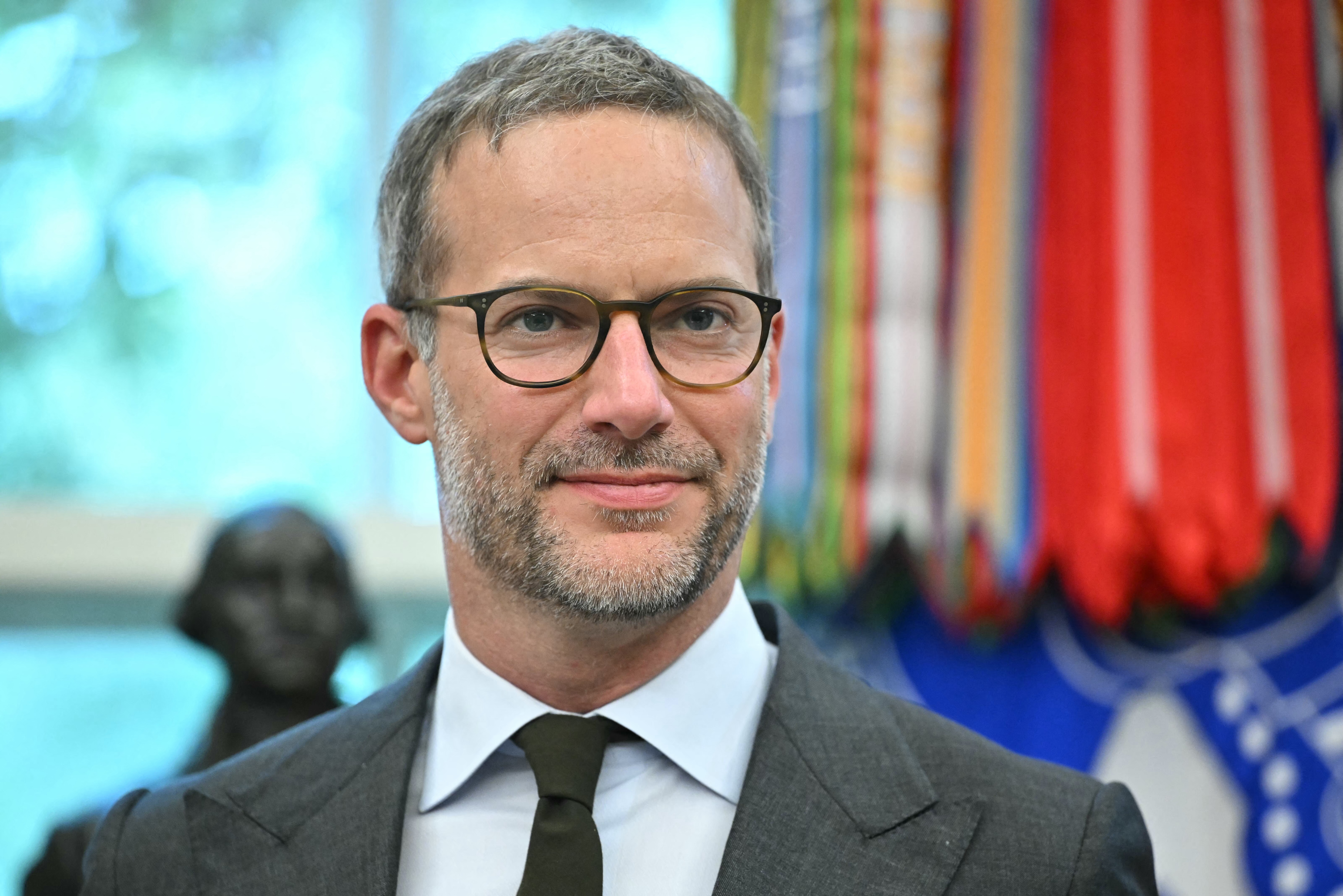 US Special Envoy for Hostage Response Adam Boehler looks on as President Donald Trump signs executive orders in the Oval Office of the White House in Washington, DC on September 5, 2025.