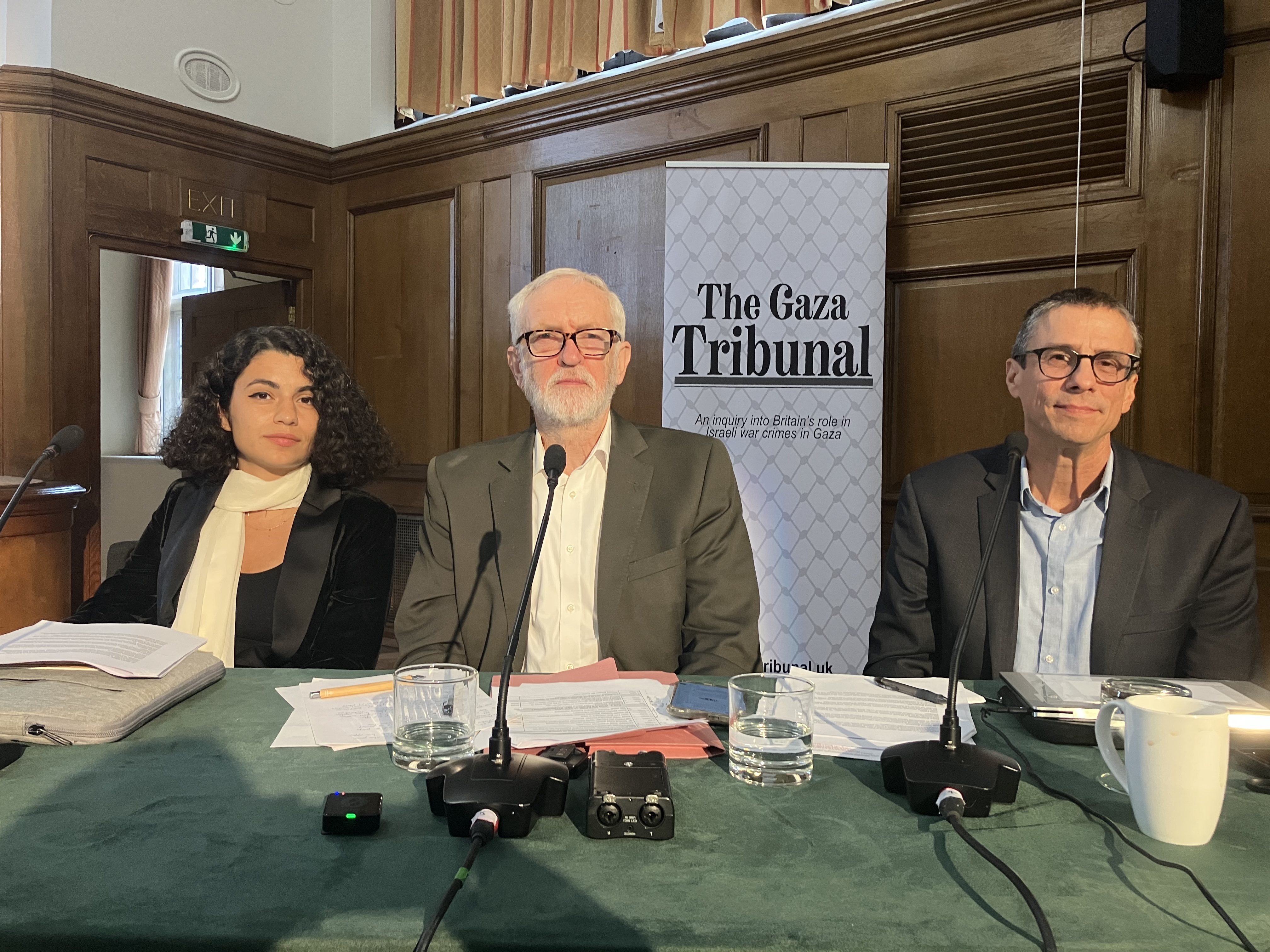 Shahd Hammouri (L), Jeremy Corbyn and Neve Gordon (R) are seated during the inquiry.