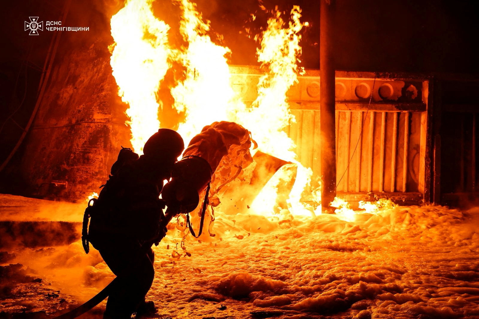 A firefighter works at the site where a critical infrastructure facility was hit by Russian drone strikes, amid Russia's attack on Ukraine, near the town of Nizhyn, Chernihiv region, Ukraine, in this handout picture released September 15, 2025. Press service of the State Emergency Service of Ukraine in Chernihiv region/Handout via REUTERS ATTENTION EDITORS - THIS IMAGE HAS BEEN SUPPLIED BY A THIRD PARTY. DO NOT OBSCURE LOGO.