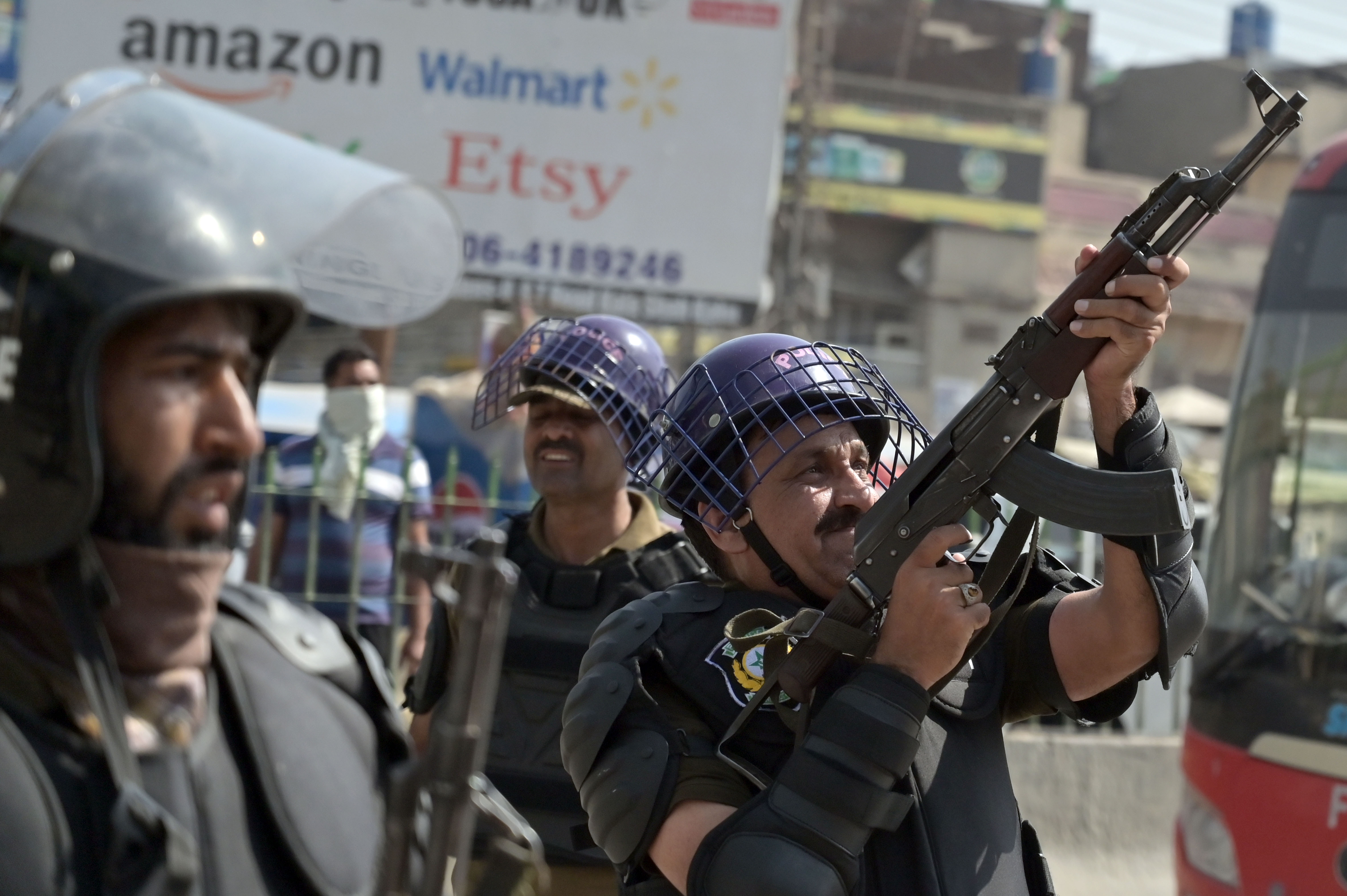 epa12450627 Police fire shots to disperse supporters of the Islamic political party Tehrik-e-Labbaik Pakistan (TLP) in Muridke, Pakistan, 13 October 2025. Nationwide protests erupted on Monday after TLP claimed its leader, Saad Hussain Rizvi, was shot and injured during a police operation in Muridke, where party workers had gathered for a rally in solidarity with Palestinians in Gaza. The violence quickly spread across major cities, leaving at least four people dead, including a police officer, and over 50 injured. EPA/A. HUSSAIN 98753