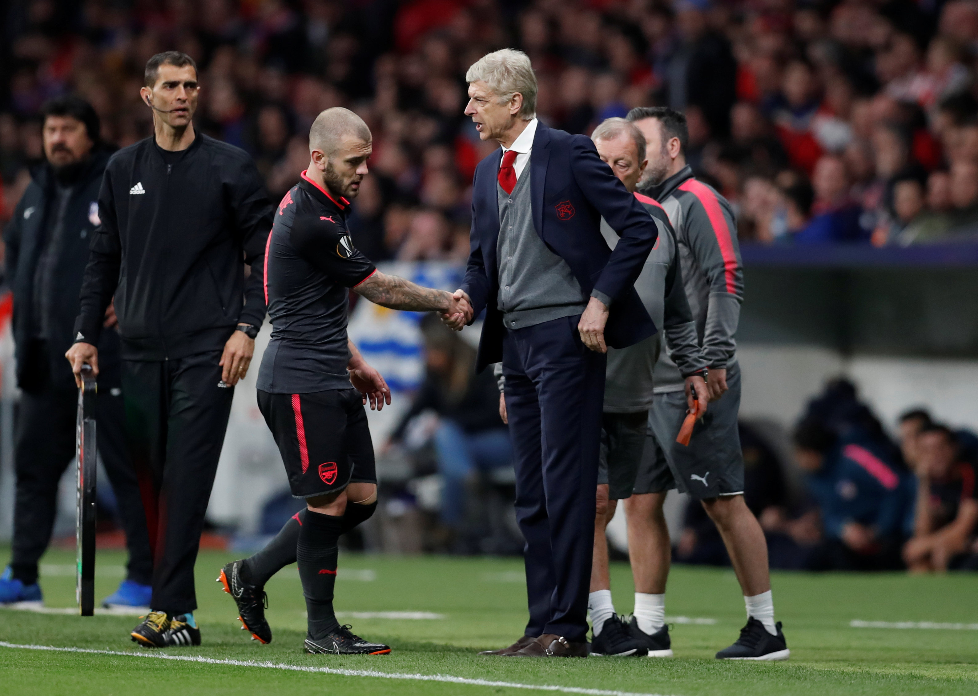 Arsene Wenger reacts.