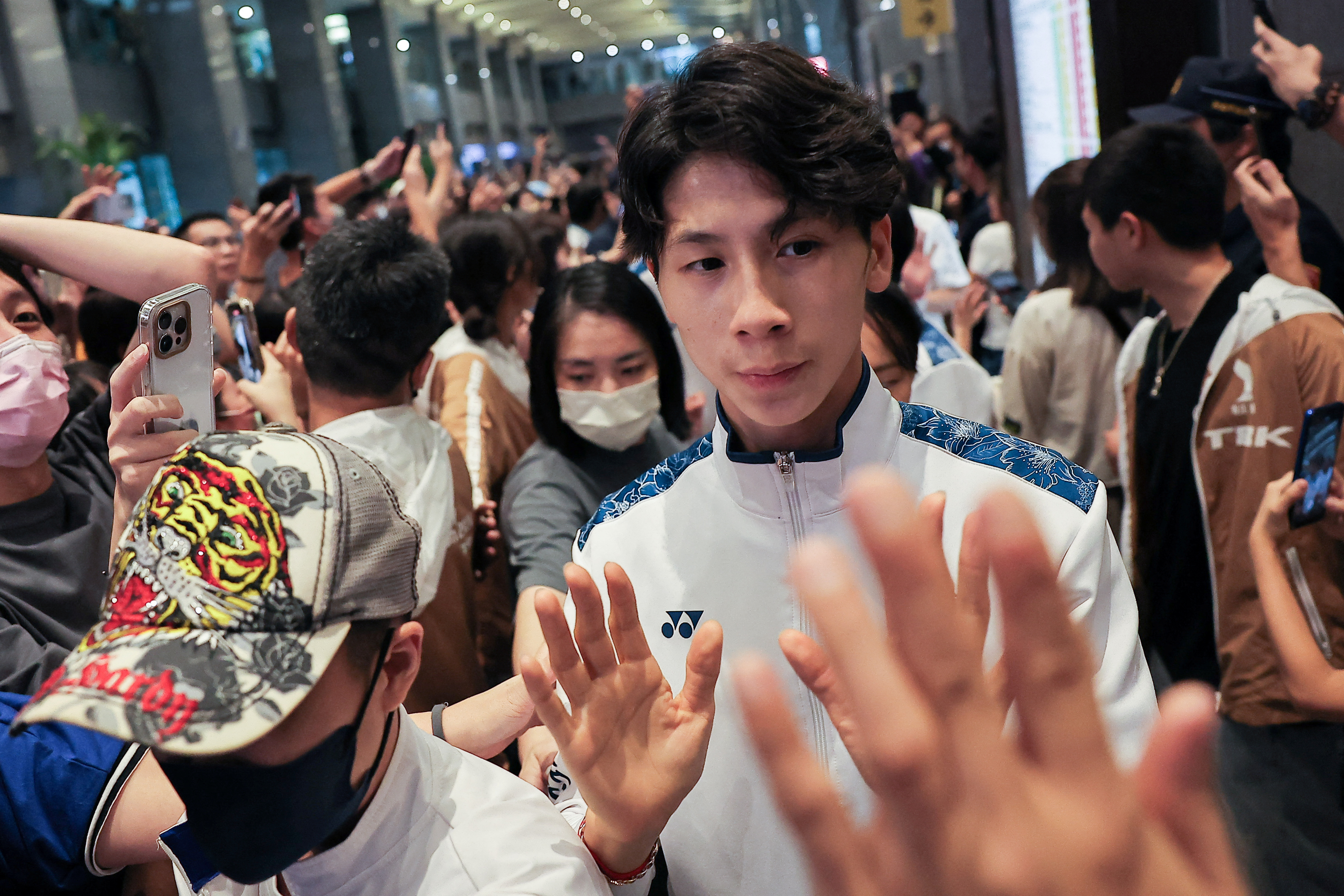 Gold medalist boxer Lin Yu-ting interact with fans as she attends an event in New Taipei City