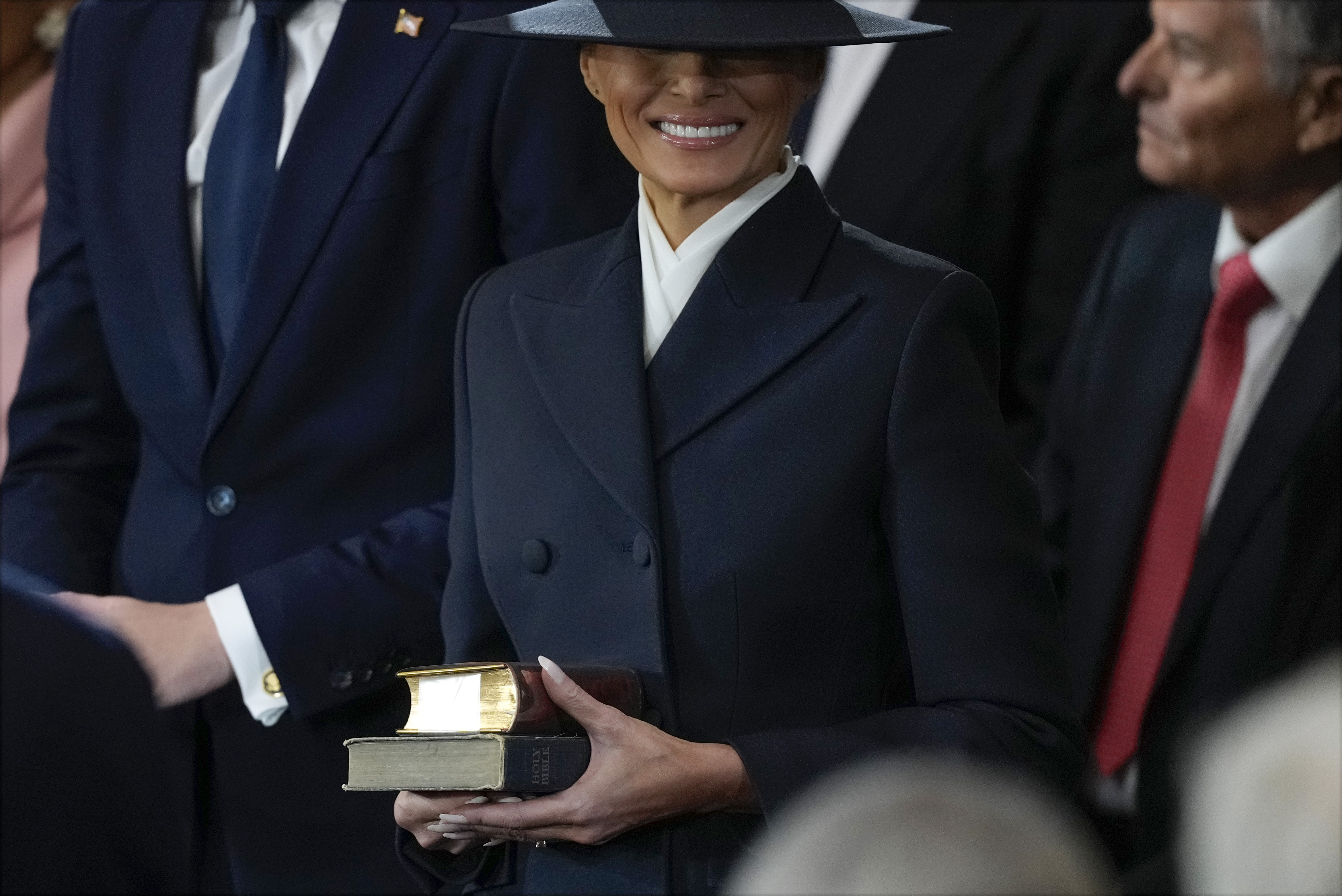 Melania Trump holds bibles for the inauguration ceremony