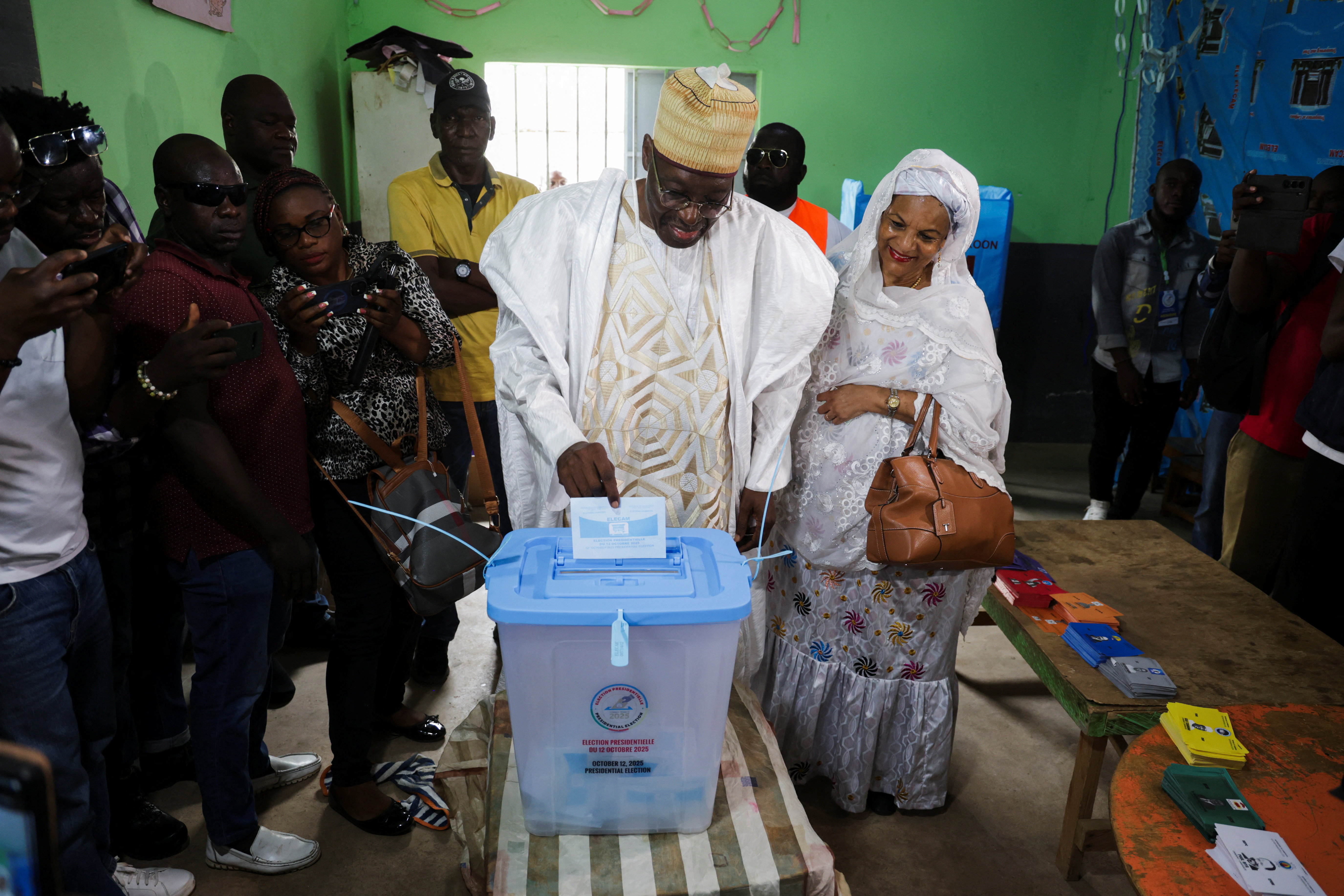 Presidential candidate Issa Tchiroma Bakary casts his vote on the day of Cameroon’s presidential election at a polling station in Garoua