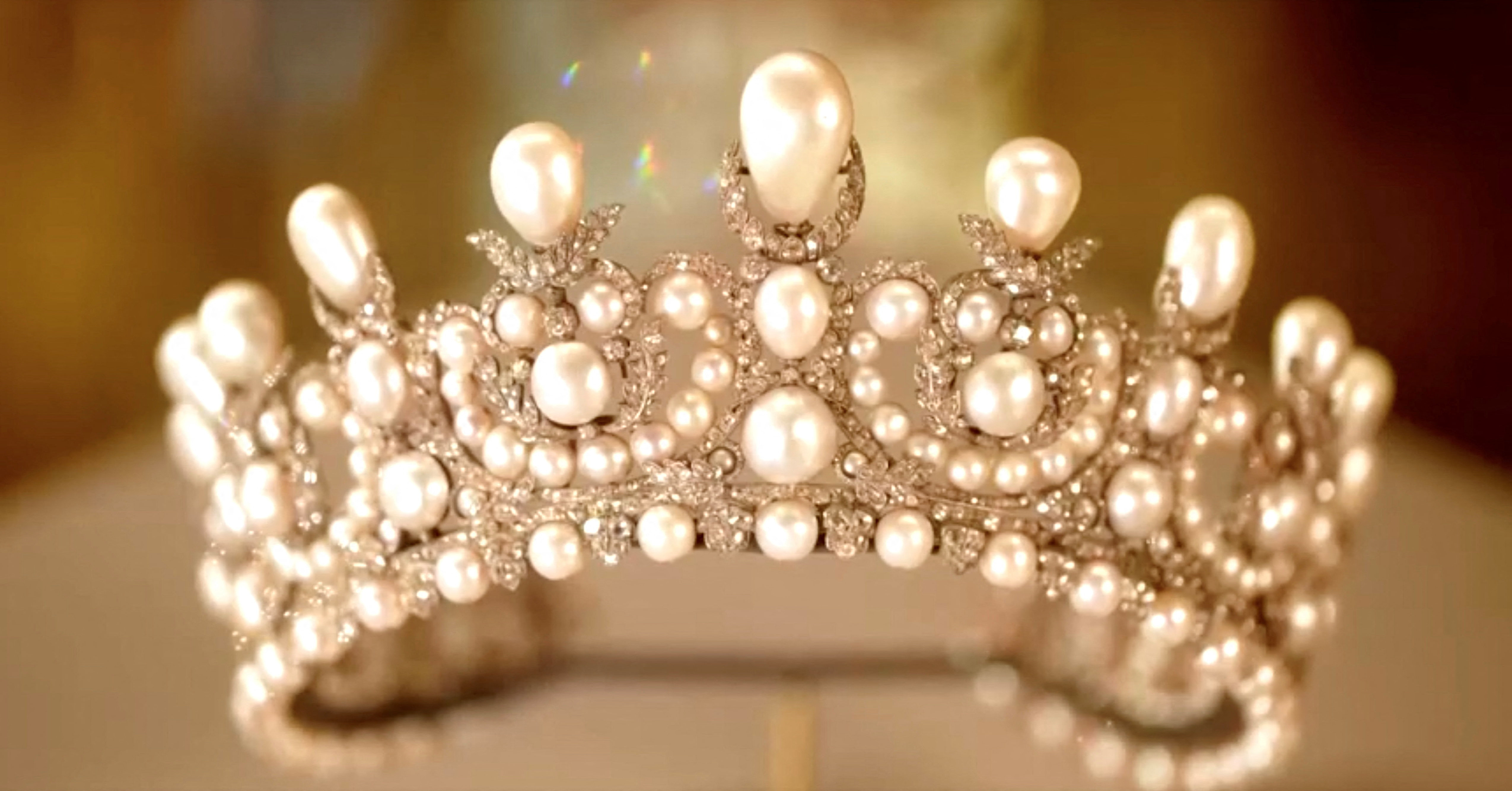 A tiara adorned with pearls worn by French Empress Eugenie, which was among the items stolen by thieves during a heist at Paris' Louvre Museum on October 19, 2025, on display in this undated still frame from a video.