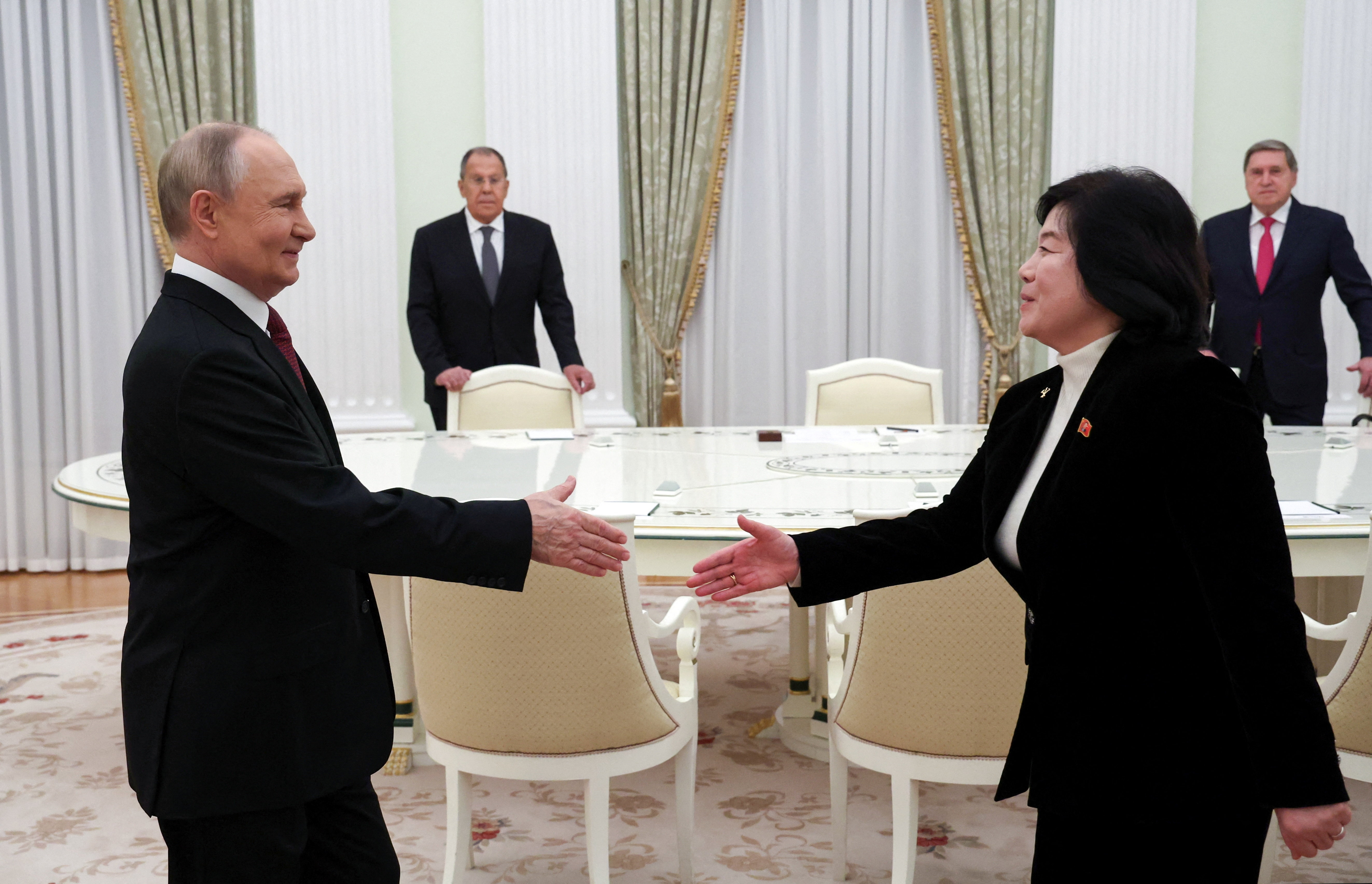 Russian President Vladimir Putin shakes hands with North Korean Foreign Minister Choe Son Hui during a meeting in Moscow, Russia, October 27, 2025. Sputnik/Vyacheslav Prokofyev/Pool via REUTERS ATTENTION EDITORS - THIS IMAGE WAS PROVIDED BY A THIRD PARTY.