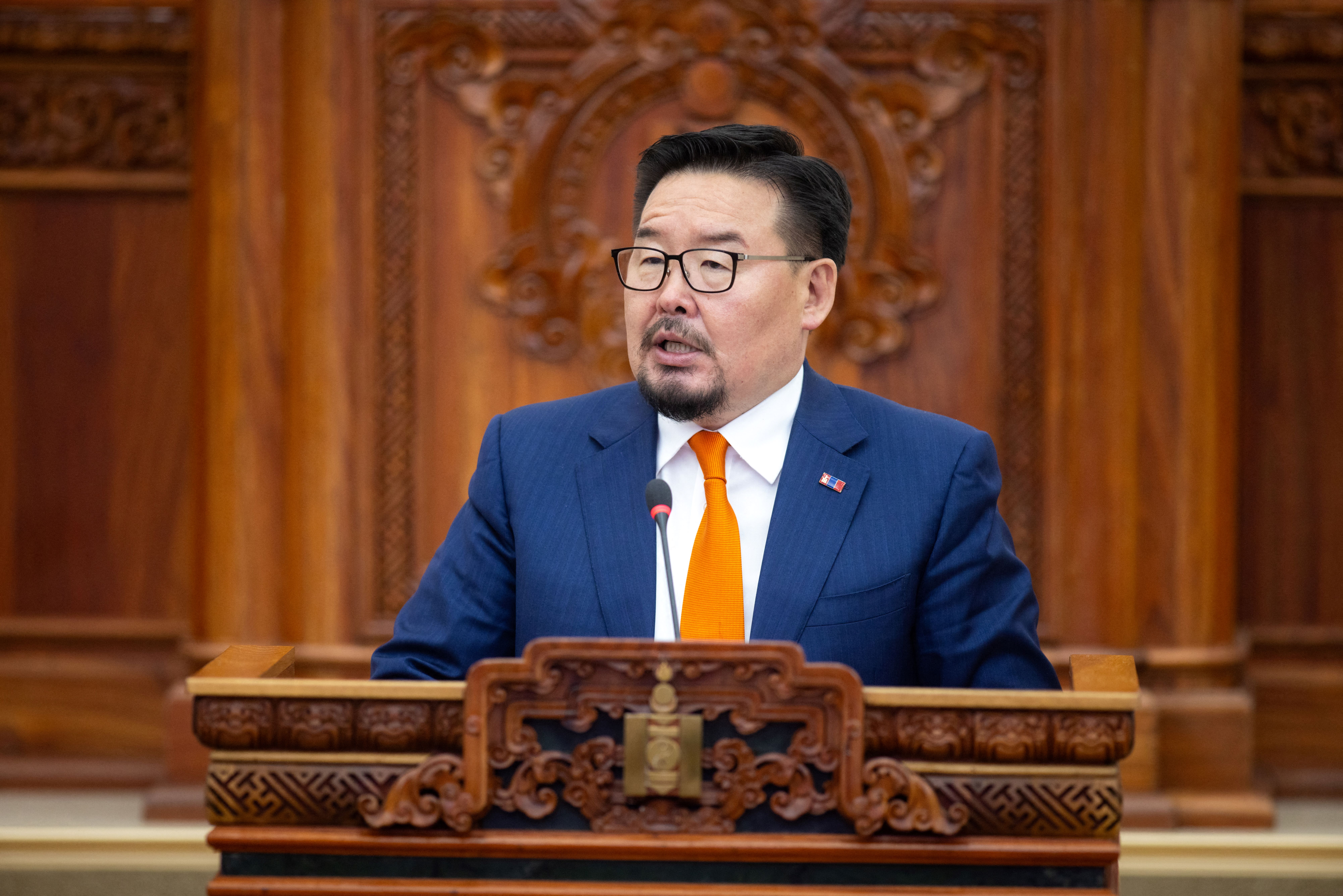 New Mongolian Prime Minister Gombojav Zandanshatar speaks after a vote in parliament in Ulaanbaatar, the capital of Mongolia on June 13, 2025. Mongolian lawmakers on June 13 swore in former top diplomat Gombojav Zandanshatar as the country's new prime minister, after his predecessor resigned following weeks of anti-corruption protests. (Photo by BYAMBASUREN BYAMBA-OCHIR / AFP)