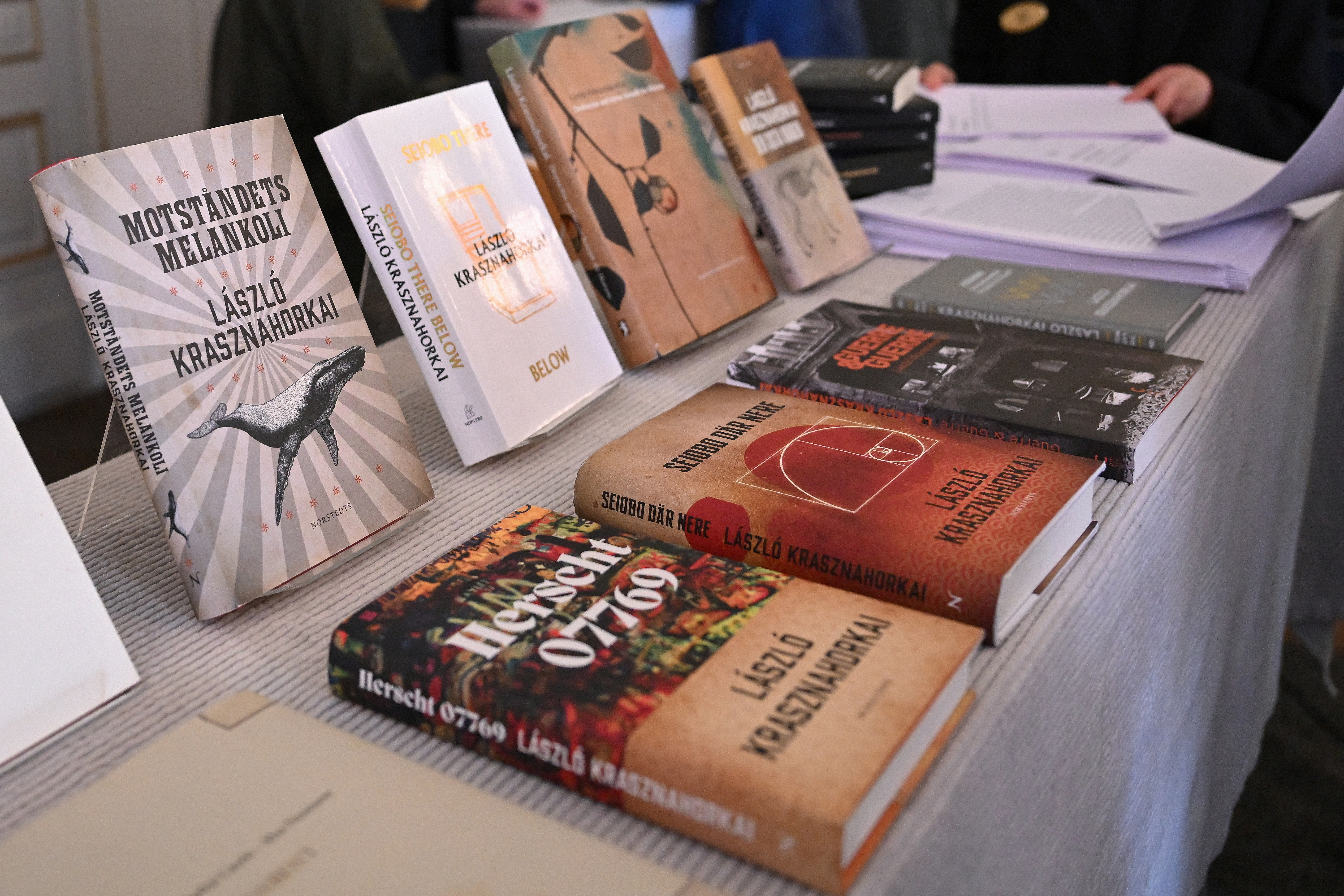 Books of Hungarian writer Laszlo Krasznahorkai, the winner of the 2025 Nobel Prize in Literature, are on display at the Swedish Academy in Stockholm, Sweden, on October 9, 2025. (Photo by Jonathan Nackstrand / AFP) / ALTERNATIVE CROP