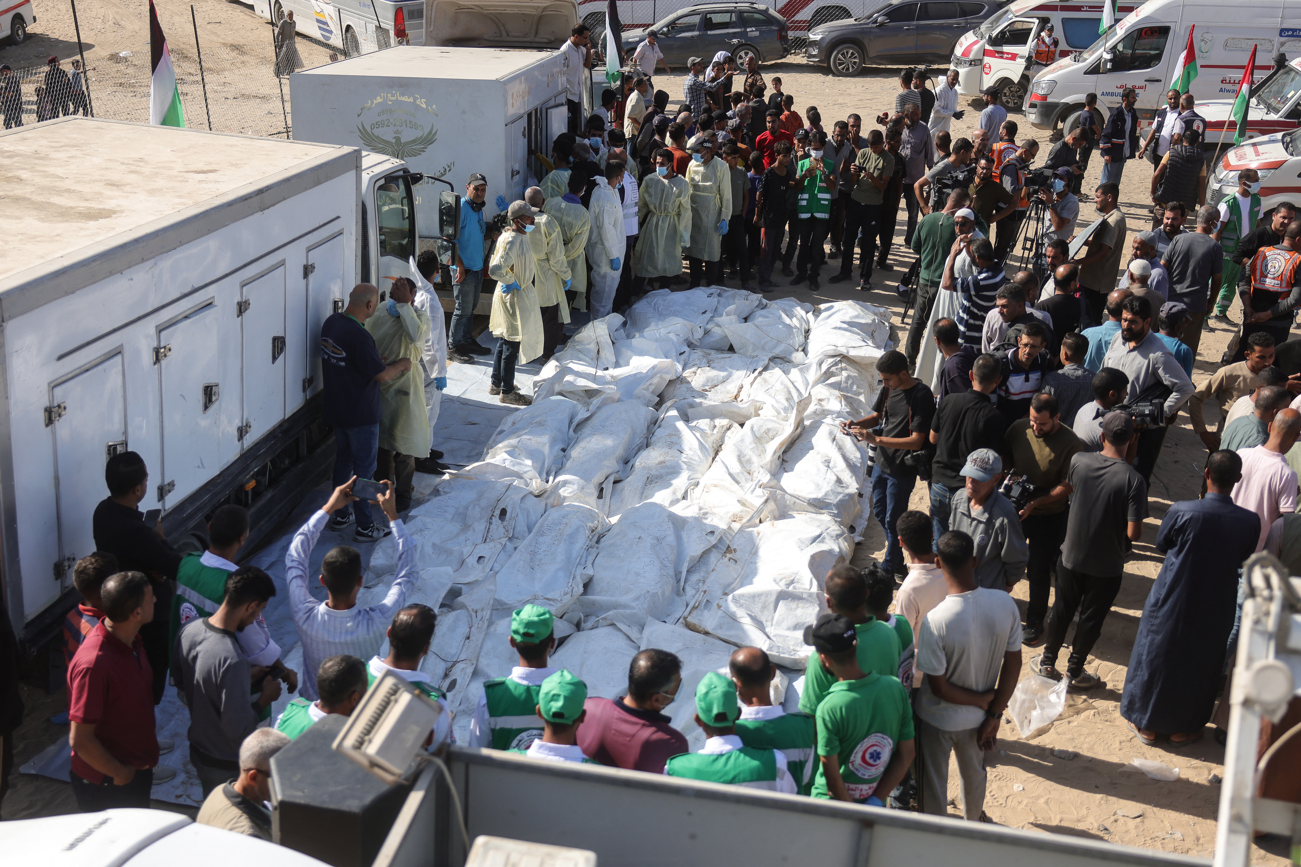 Families mourn as mass burial held for unidentified Palestinians in Gaza