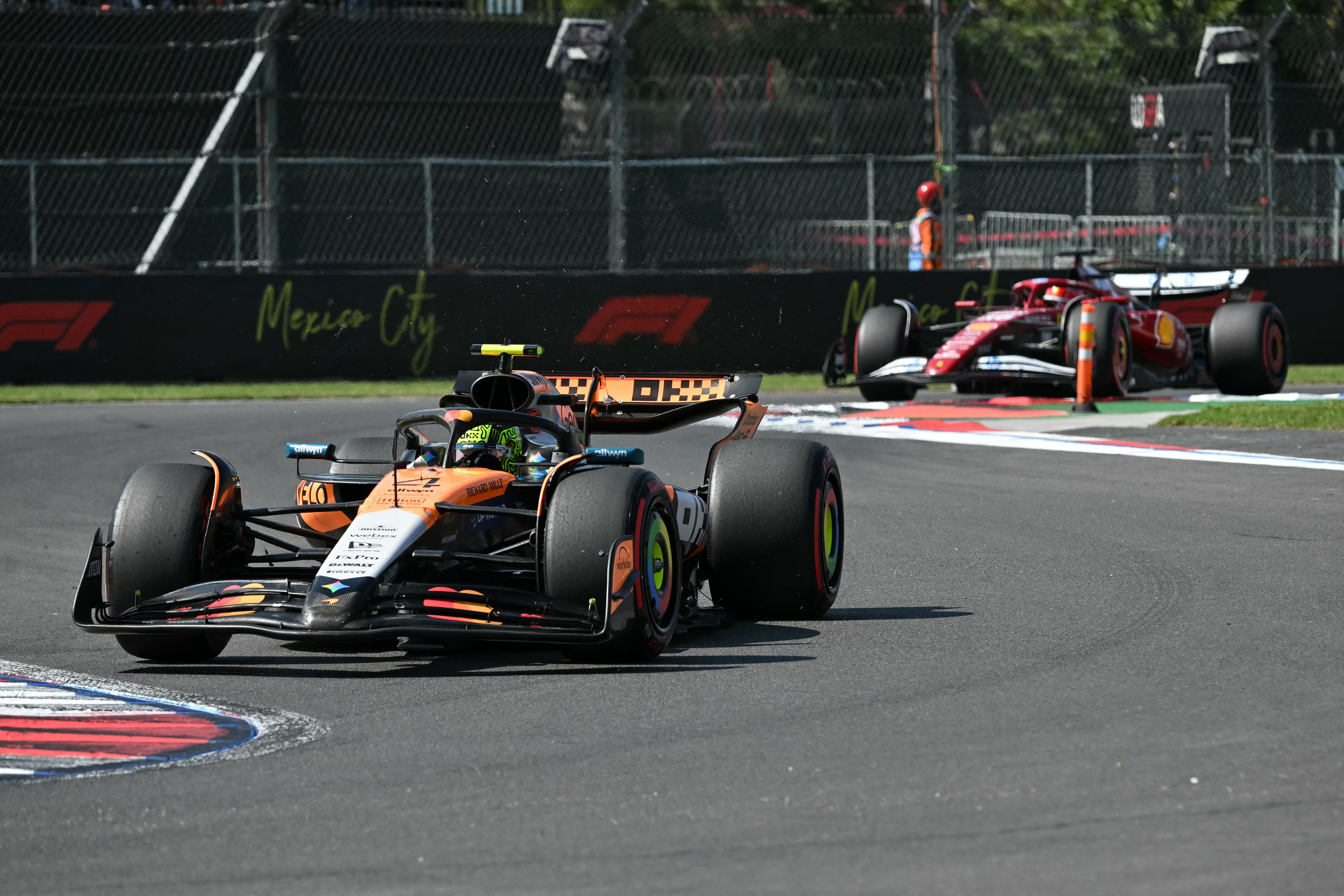 Lando Norris and Charles LeClerc in action.
