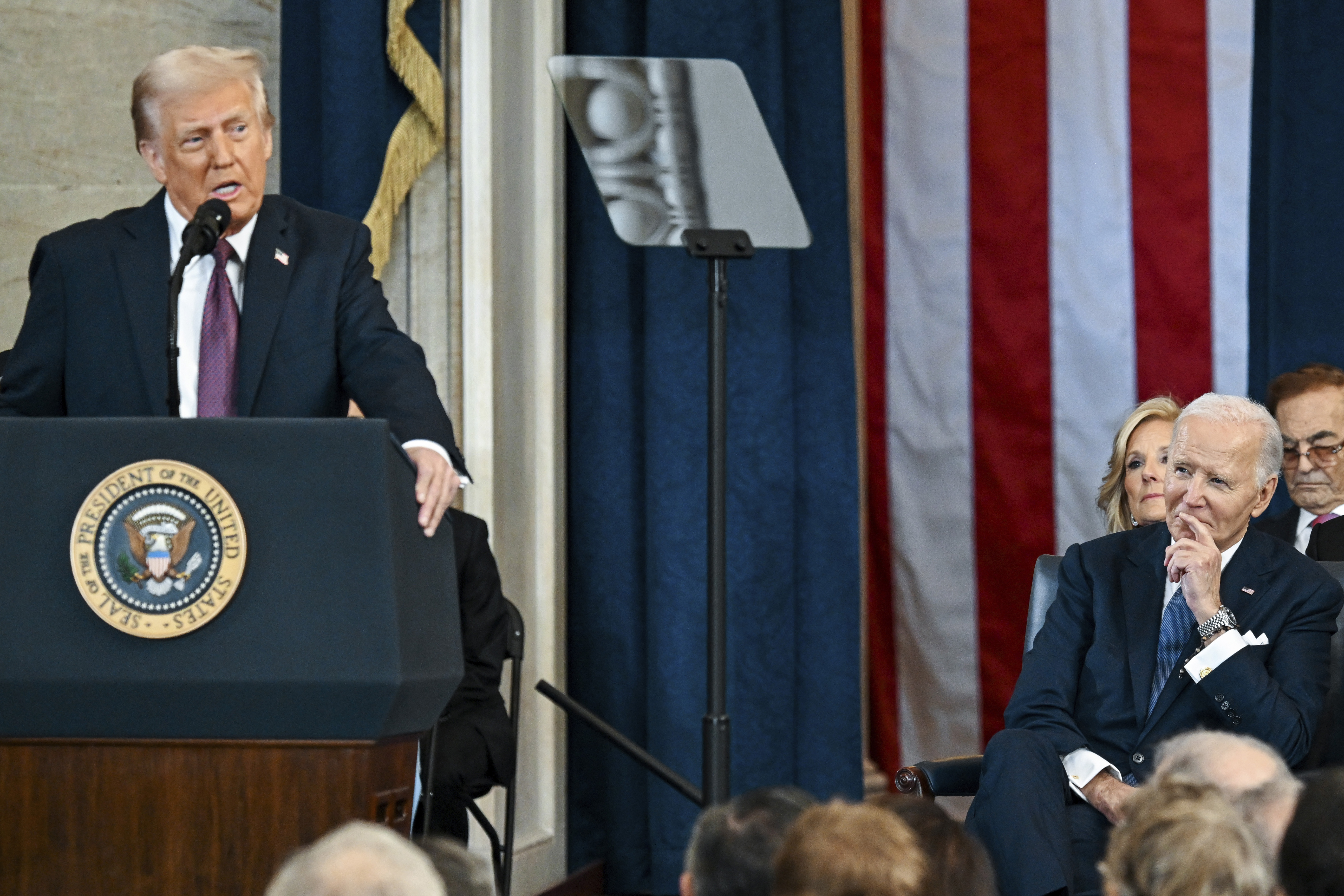 Joe Biden watches as Trump gives his inaugural speech
