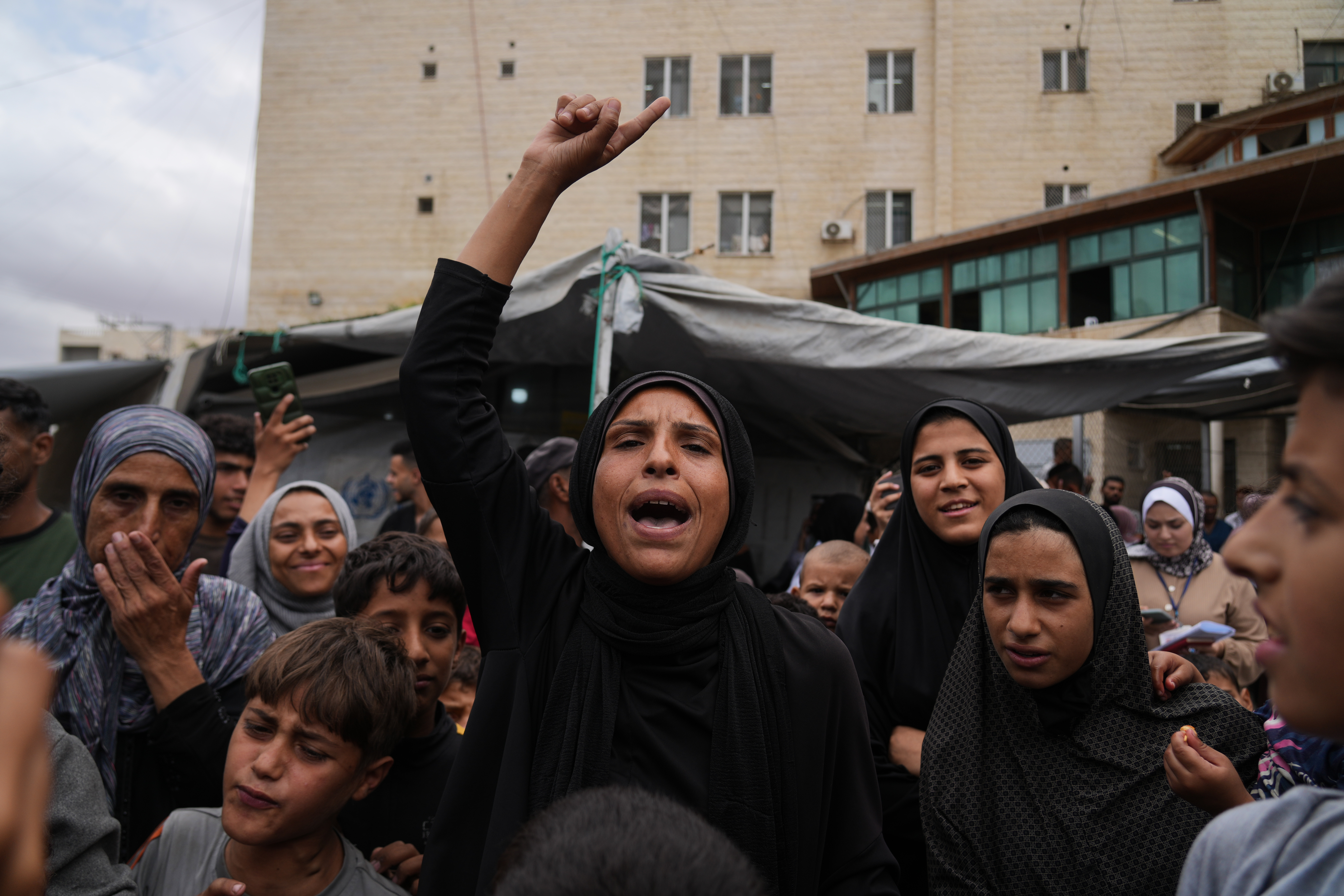 Gaza residents flood streets in hope of ending prolonged war