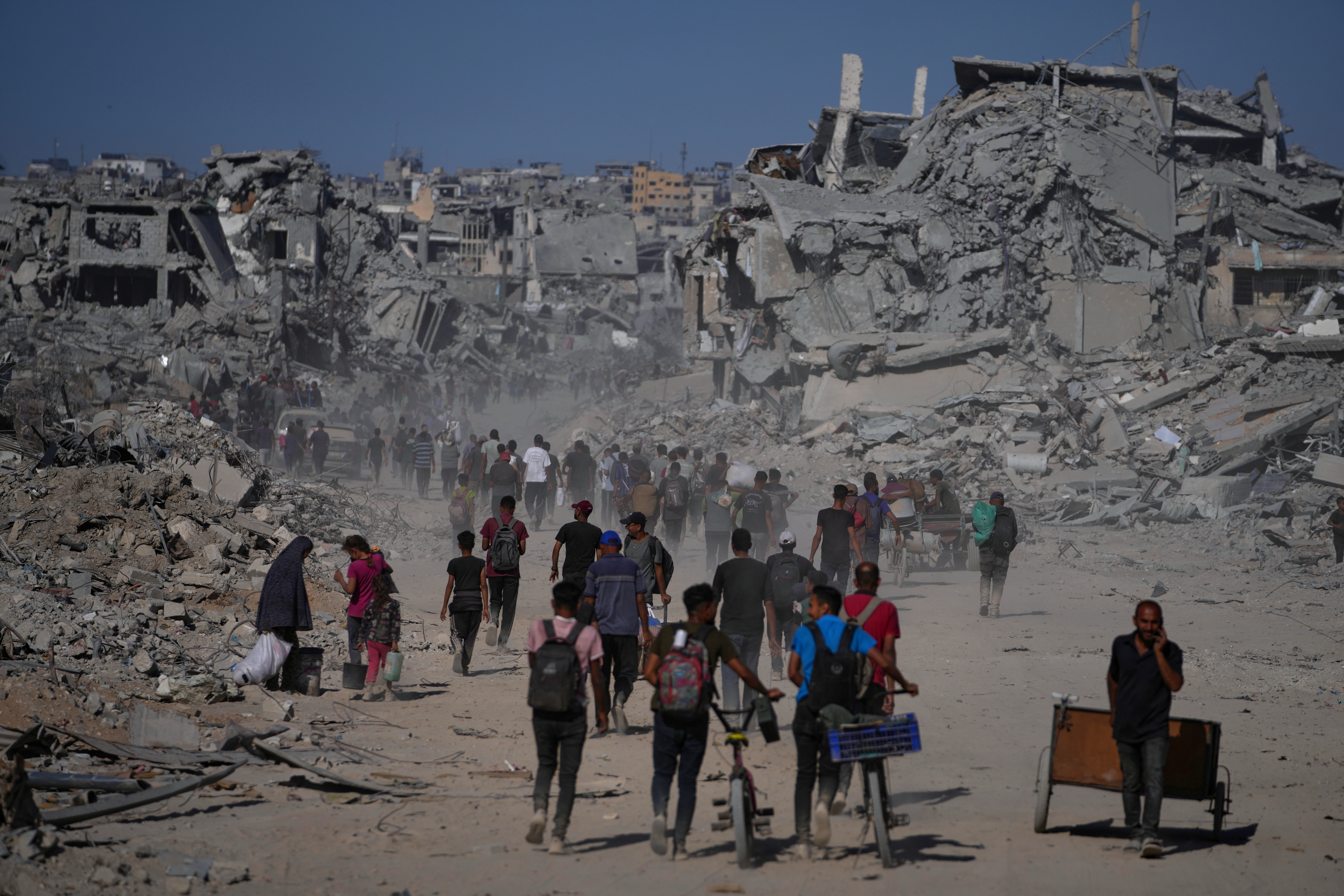 Tens of thousands return to shattered Gaza homes after ceasefire