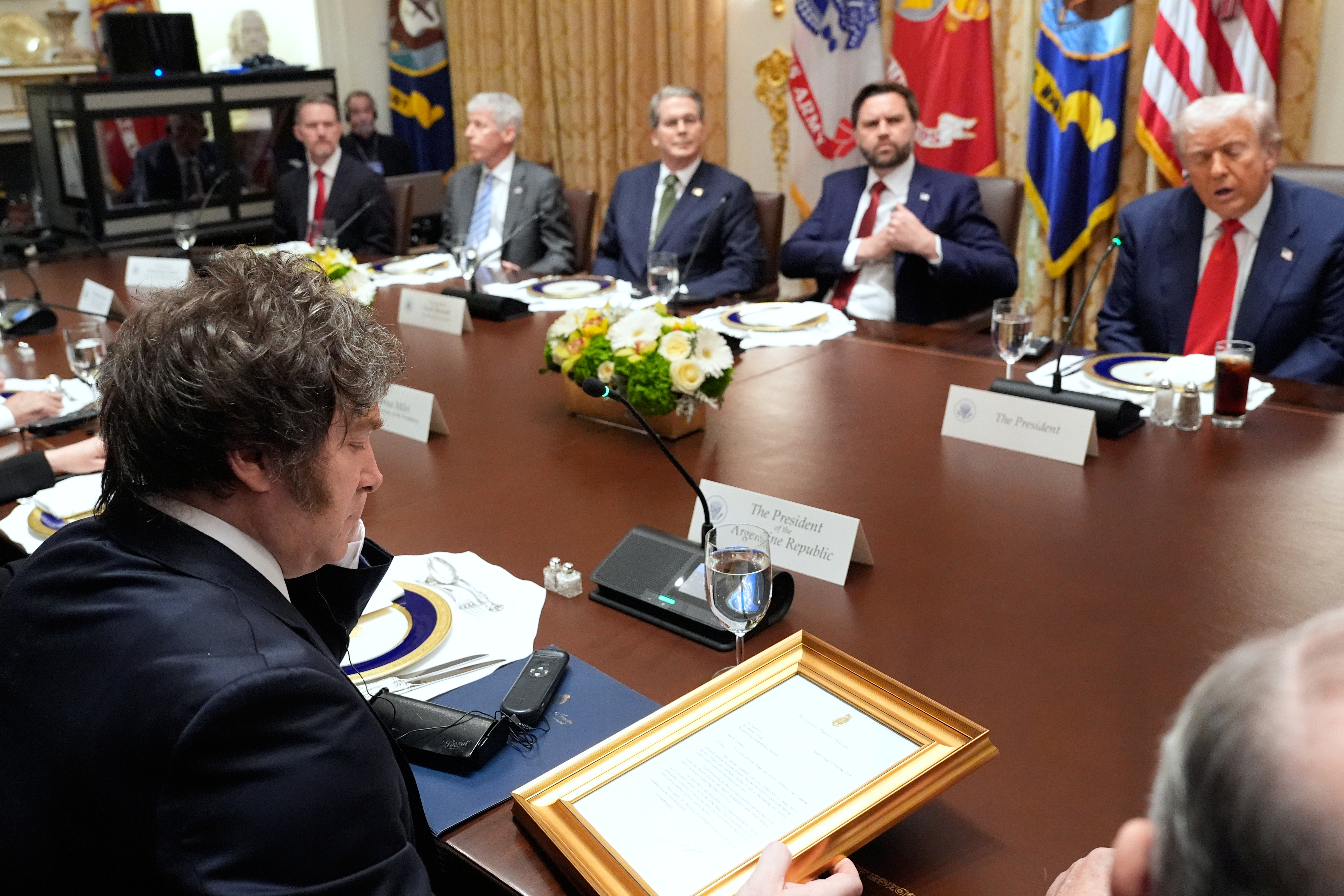 Donald Trump and Javier Milei join Trump officials around the Cabinet meeting table