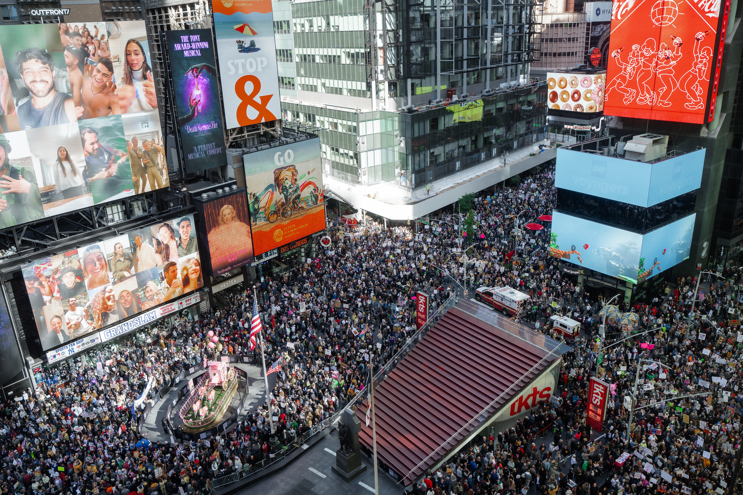 An aerial view of Times Square packed with No Kings protesters