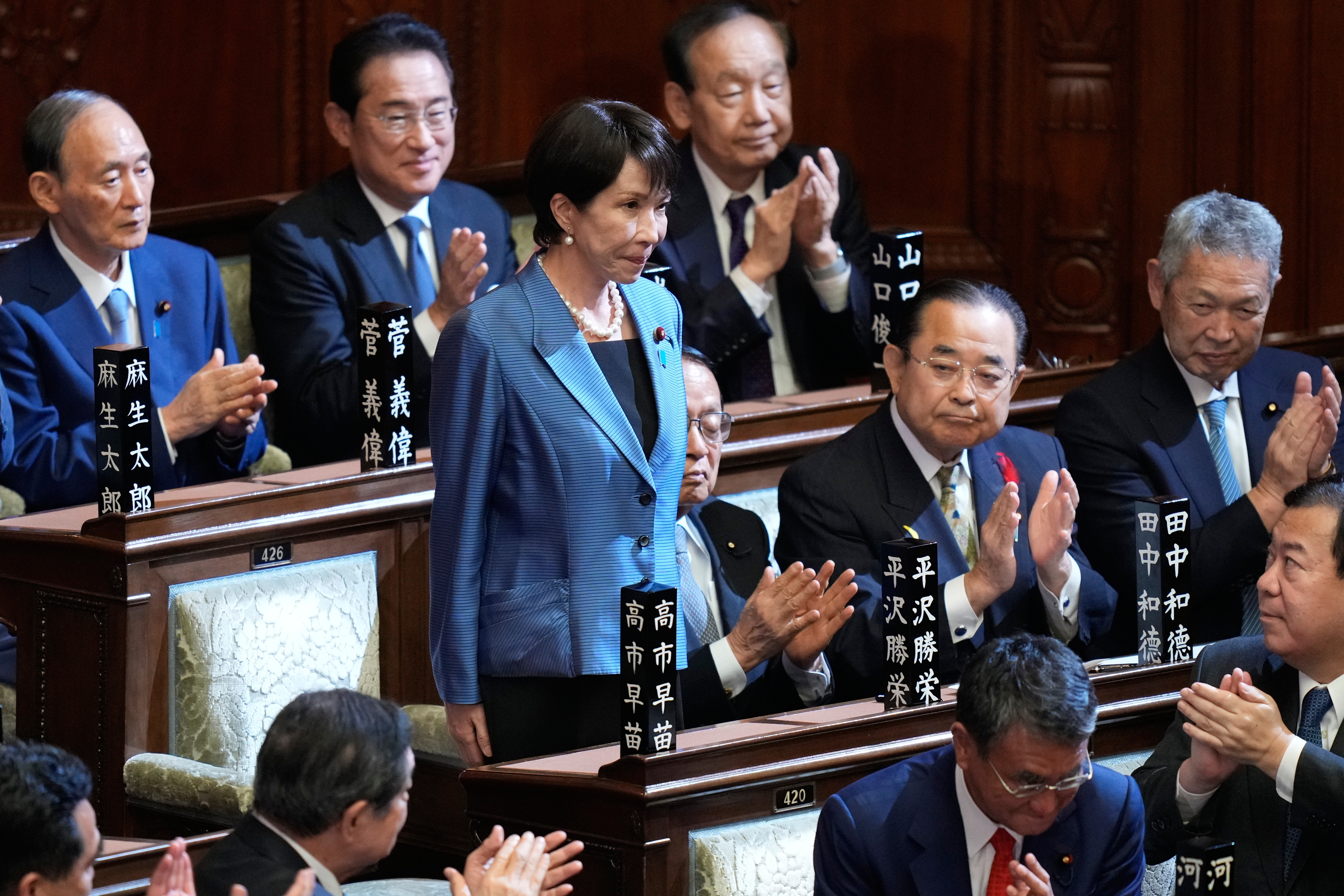 Lawmakers applaud as Sanae Takaichi was elected as Japan's new PM
