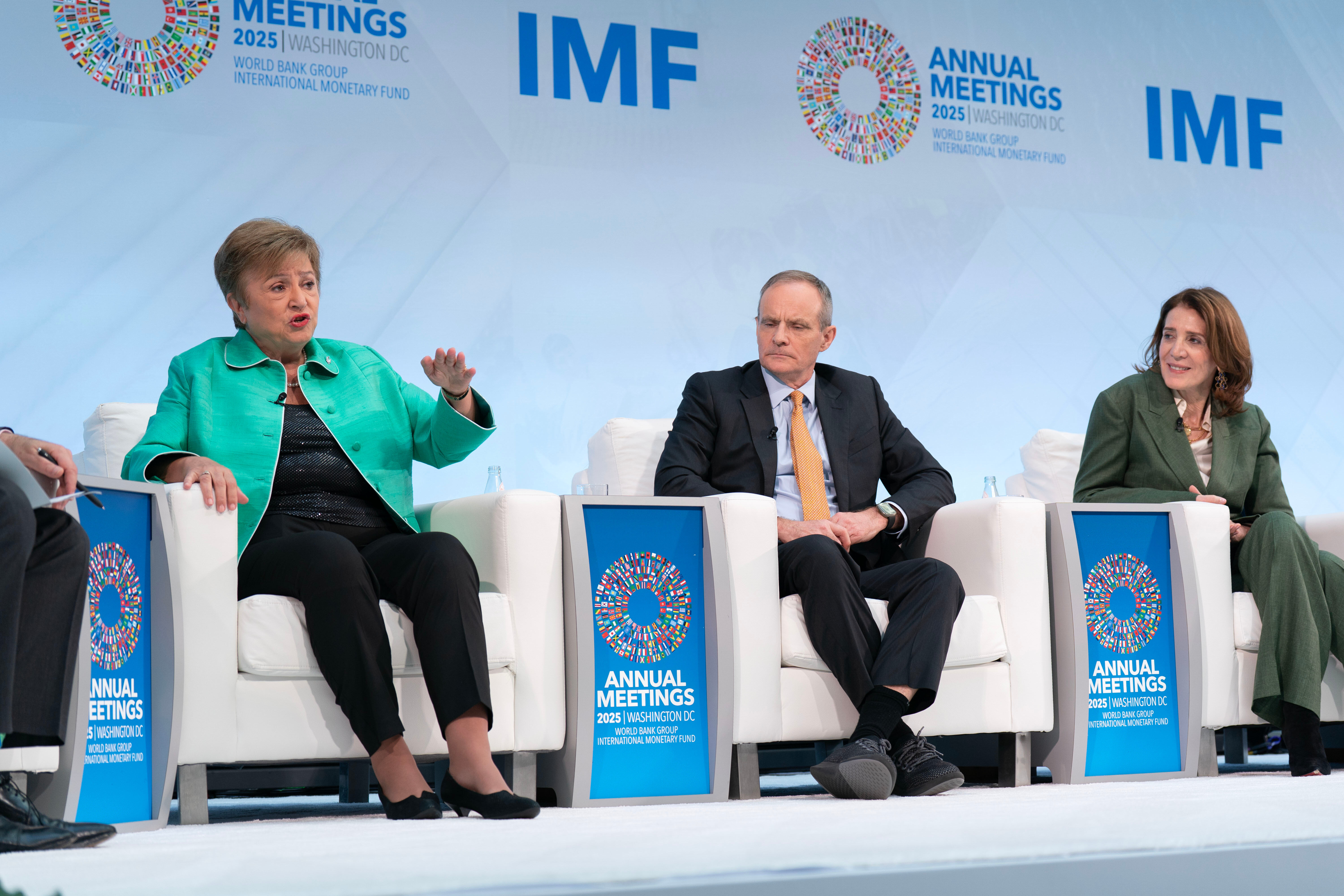 International Monetary Fund (IMF) Managing Director Kristalina Georgieva, Professor of Entrepreneurship at the MIT Sloan School of Management Simon Johnson and President and Chief Investment Officer of Alphabet and Google Ruth Porat speak at a conference.