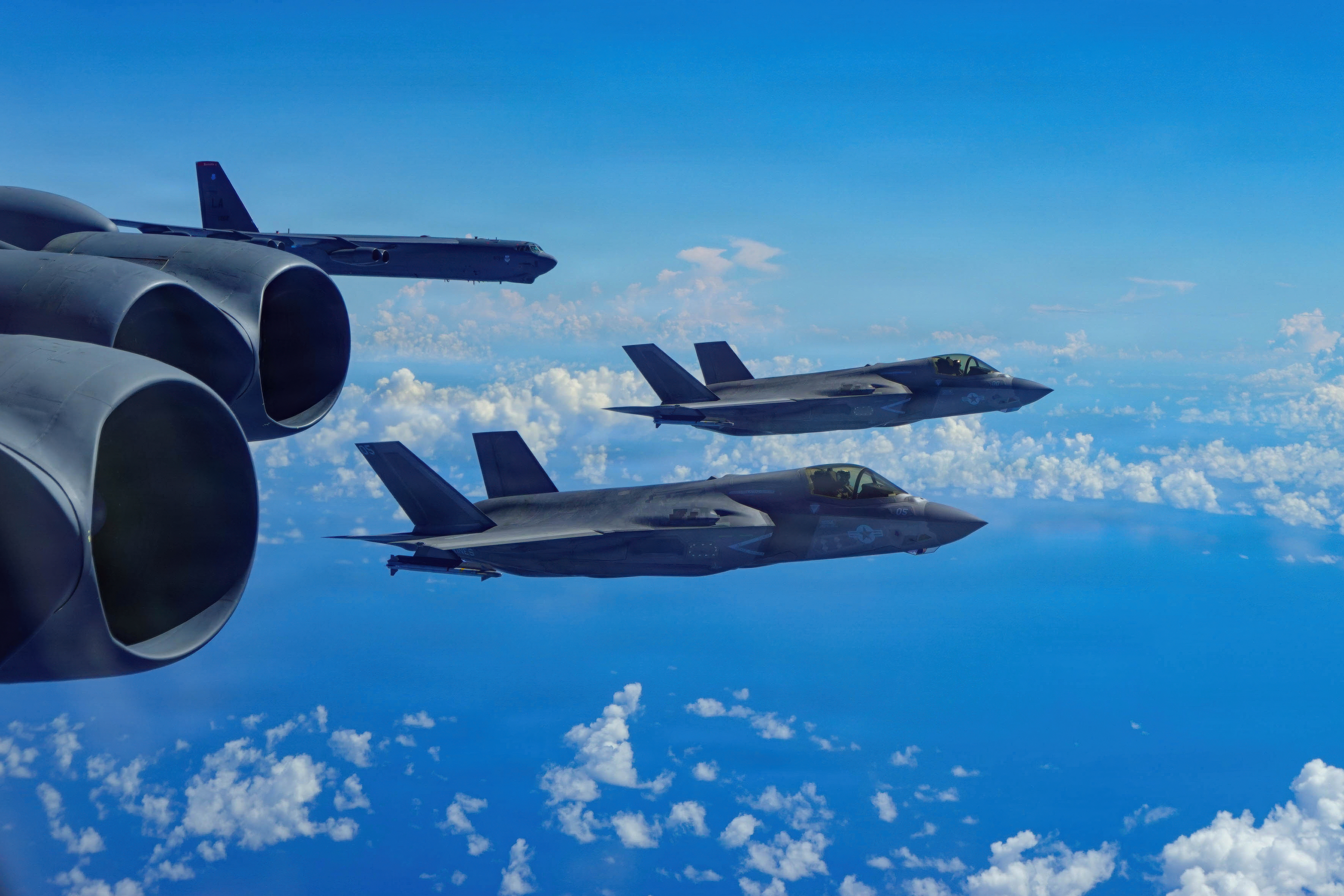 In this image provided by the U.S. Air Force, a Air Force B-52H Stratofortress bomber flies with Marine Corps F-35B Lightning II aircraft in the U.S. Southern Command area of responsibility, Oct. 15, 2025. (U.S. Air Force via AP)