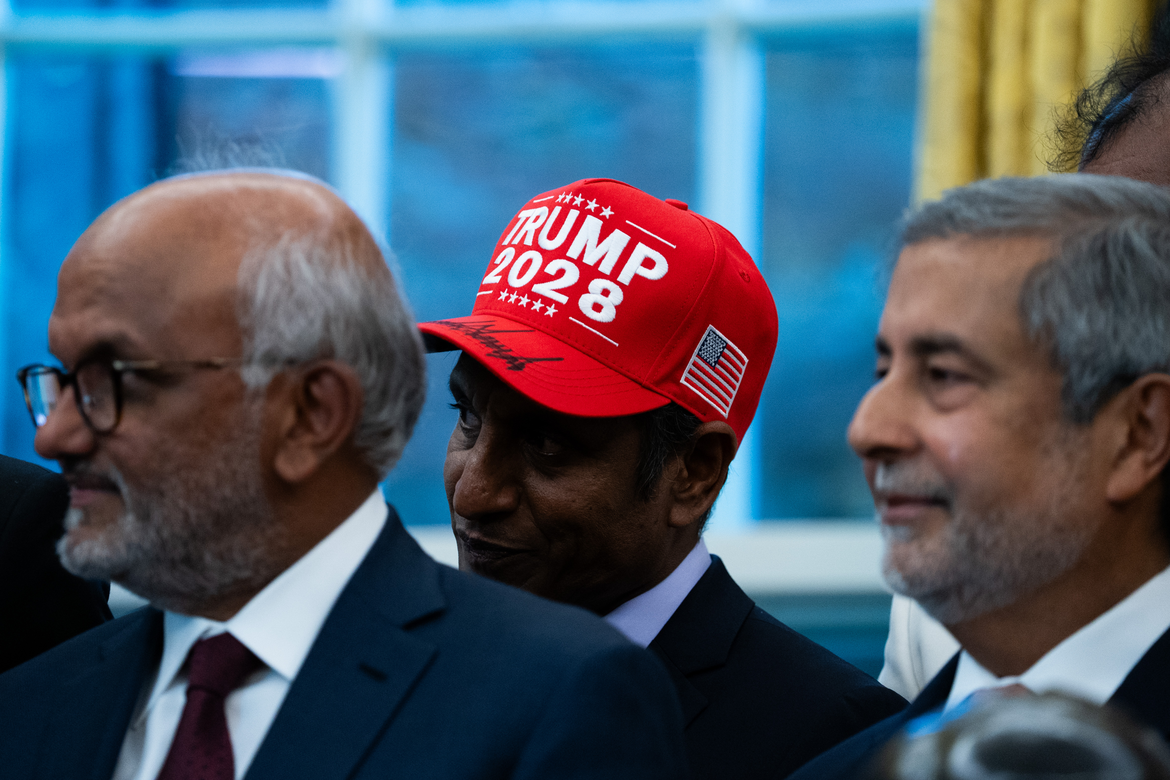 epa12471544 An attendee at a Diwali celebration in the Oval Office wears a 'Trump 2028' hat to the White House in Washington, DC, USA, 21 October 2025. EPA/ALLISON ROBBERT / POOL