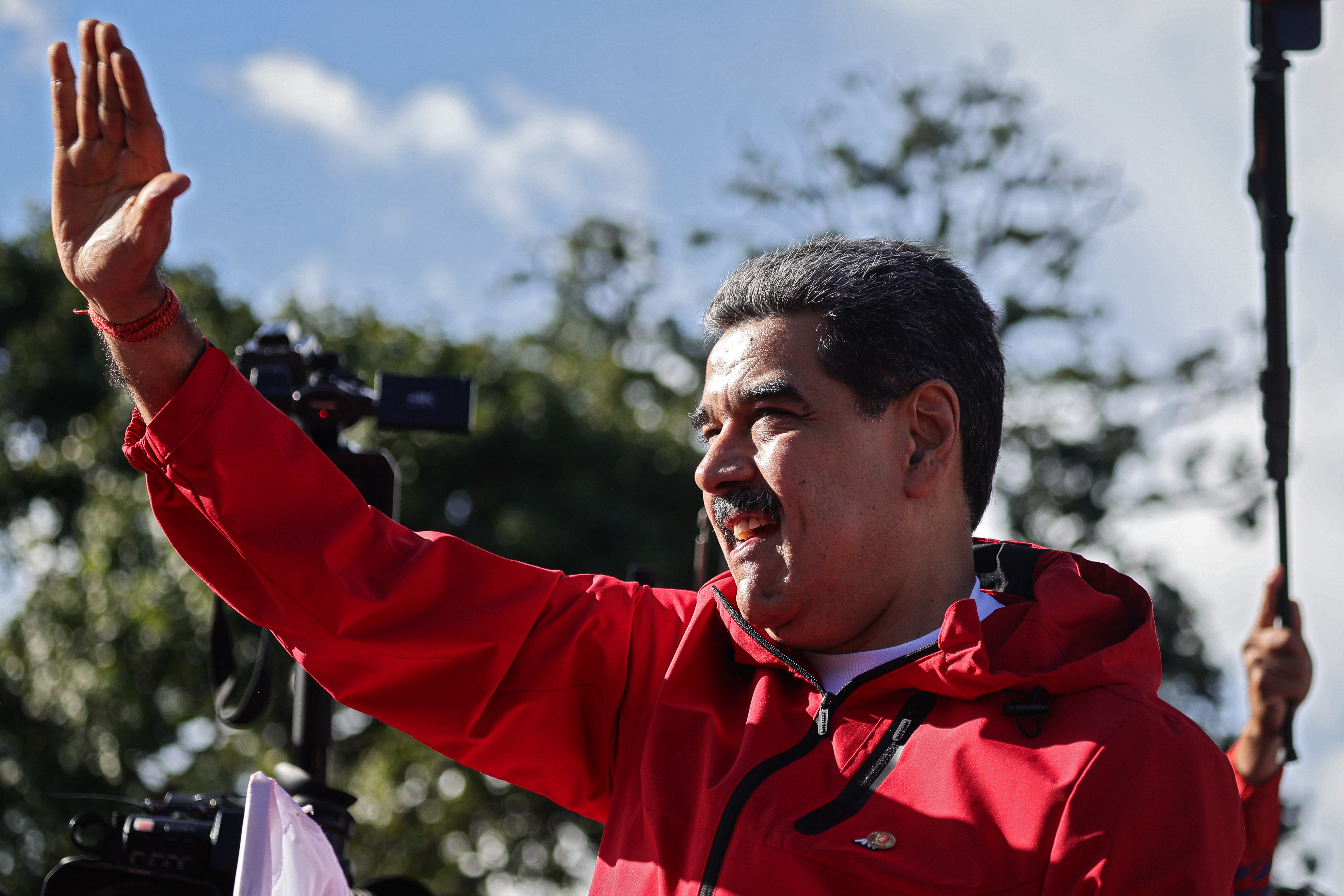 CARACAS, VENEZUELA - OCTOBER 12: President Nicolás Maduro of Venezuela greets his supporters during a rally to commemorate Indigenous Resistance Day on October 12, 2025 in Caracas, Venezuela. (Photo by Jesus Vargas/Getty Images)