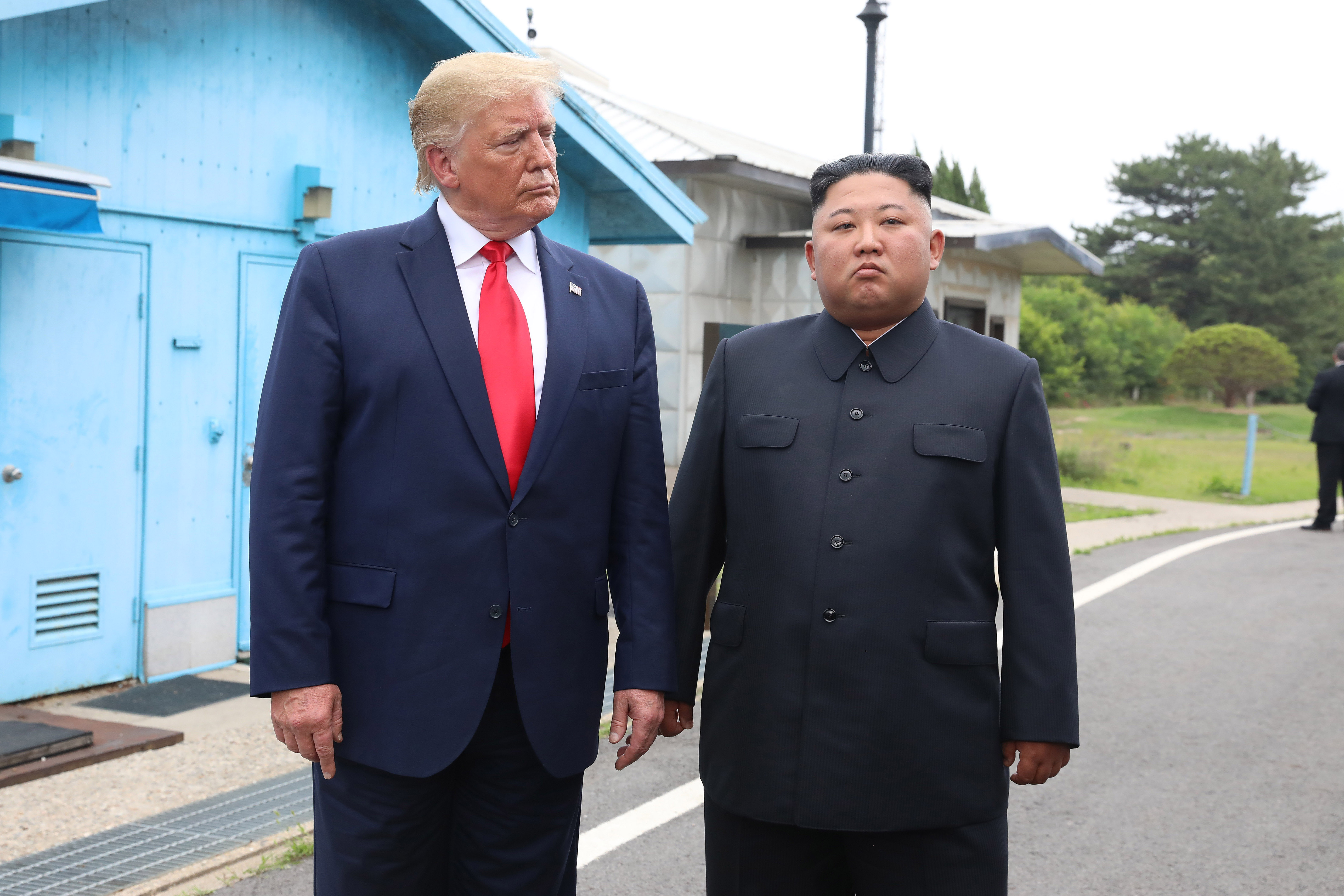 PANMUNJOM, SOUTH KOREA - JUNE 30 (SOUTH KOREA OUT): A handout photo provided by Dong-A Ilbo of North Korean leader Kim Jong Un and U.S. President Donald Trump inside the demilitarized zone (DMZ) separating the South and North Korea on June 30, 2019 in Panmunjom, South Korea. U.S. President Donald Trump and North Korean leader Kim Jong-un briefly met at the Korean demilitarized zone (DMZ) on Sunday, with an intention to revitalize stalled nuclear talks and demonstrate the friendship between both countries. The encounter was the third time Trump and Kim have gotten together in person as both leaders have said they are committed to the "complete denuclearization" of the Korean peninsula. (Handout photo by Dong-A Ilbo via Getty Images/Getty Images)
