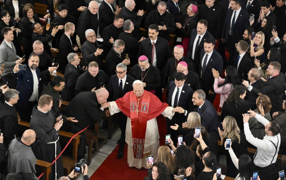 epa12554131 Pope Leo XIV (C) arrives to attend a meeting with bishops, priests, deacons, consecrated persons, and pastoral workers at the Cathedral of the Holy Spirit, also known as Saint Esprit Cathedral in Istanbul, Turkey, 28 November 2025. Pope Leo XIV is on his first apostolic journey outside Italy since his election as pontiff, visiting Turkey and Lebanon from 27 November to 02 December. EPA/ALESSANDRO DI MEO