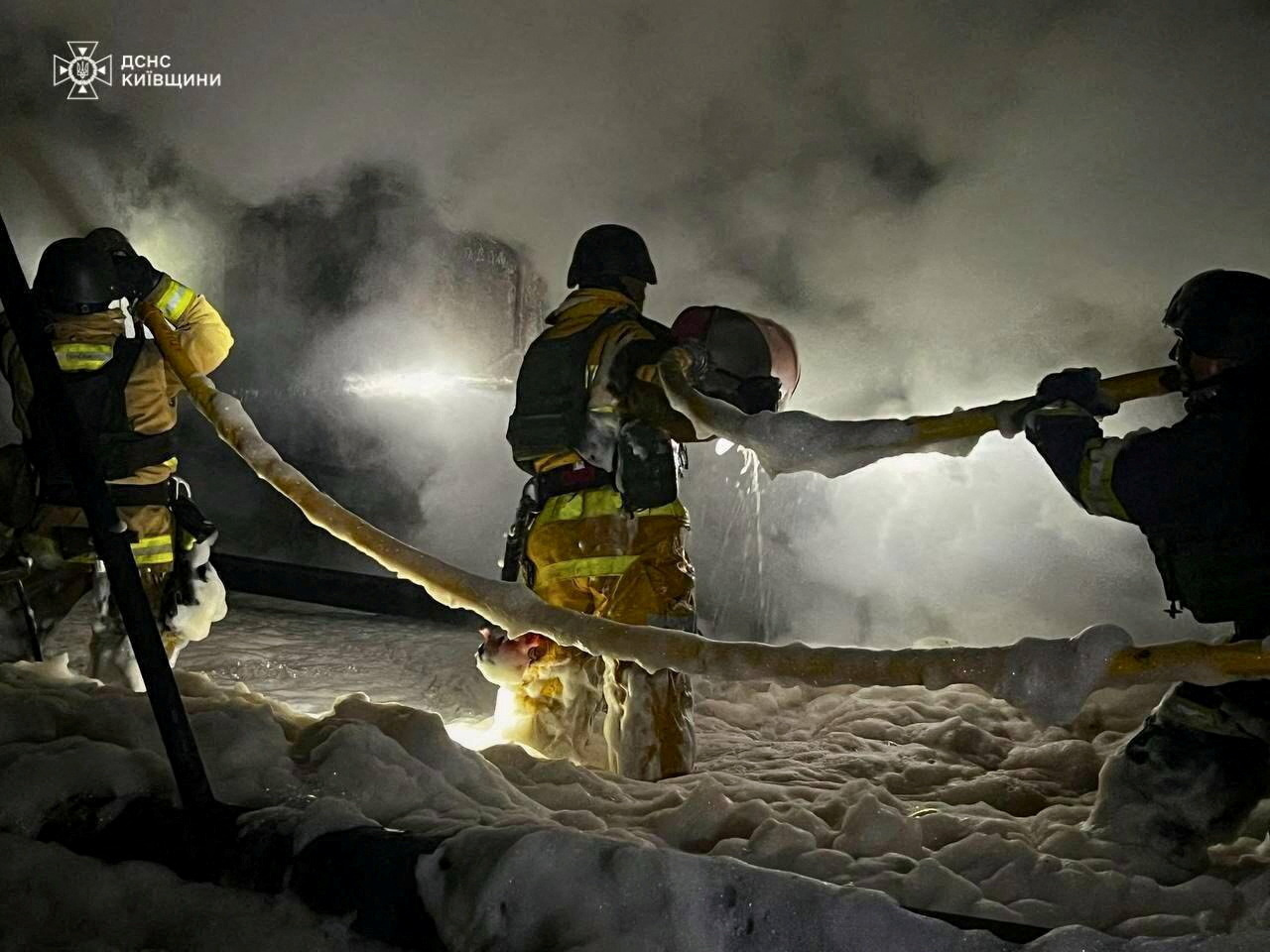 FILE PHOTO: Firefighters work at the site of a thermal power generation facility hit by Russian drone strikes, amid Russia's attack on Ukraine, in Kyiv region, Ukraine September 8, 2025. Press service of the State Emergency Service of Ukraine in Kyiv region/Handout via REUTERS ATTENTION EDITORS - THIS IMAGE HAS BEEN SUPPLIED BY A THIRD PARTY. DO NOT OBSCURE LOGO./File Photo