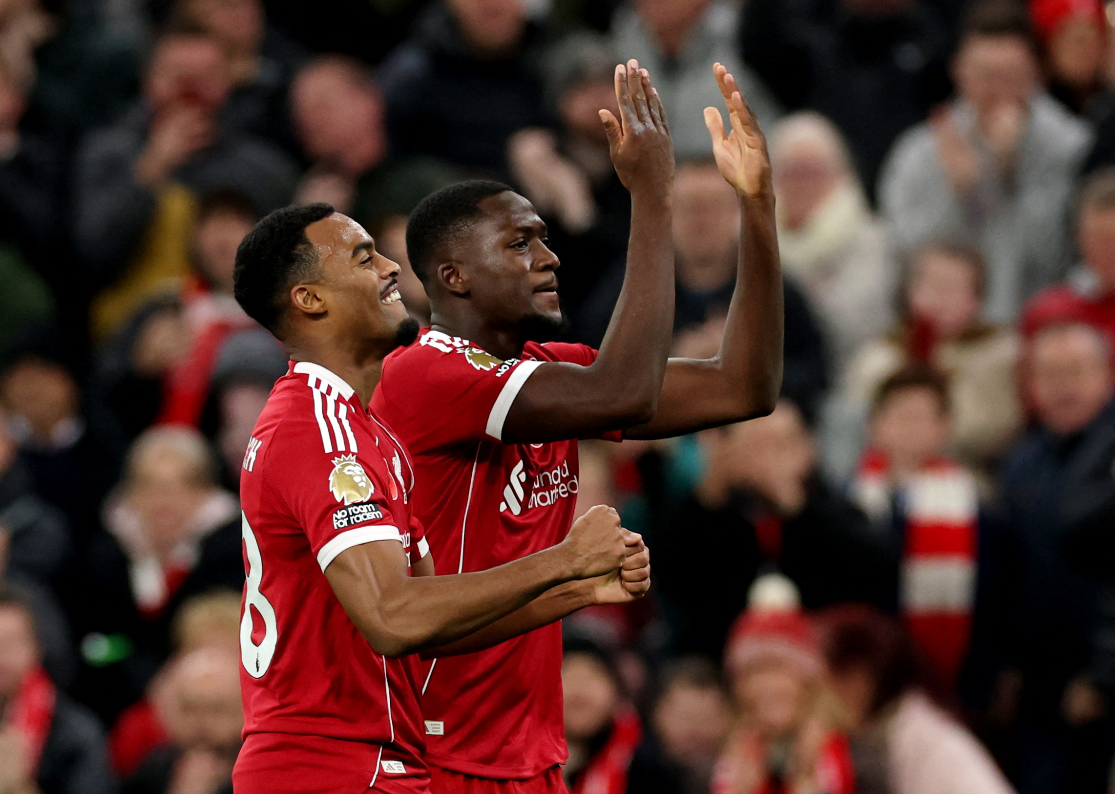 Liverpool's Ryan Gravenberch celebrates scoring their second goal with Ibrahima Konate