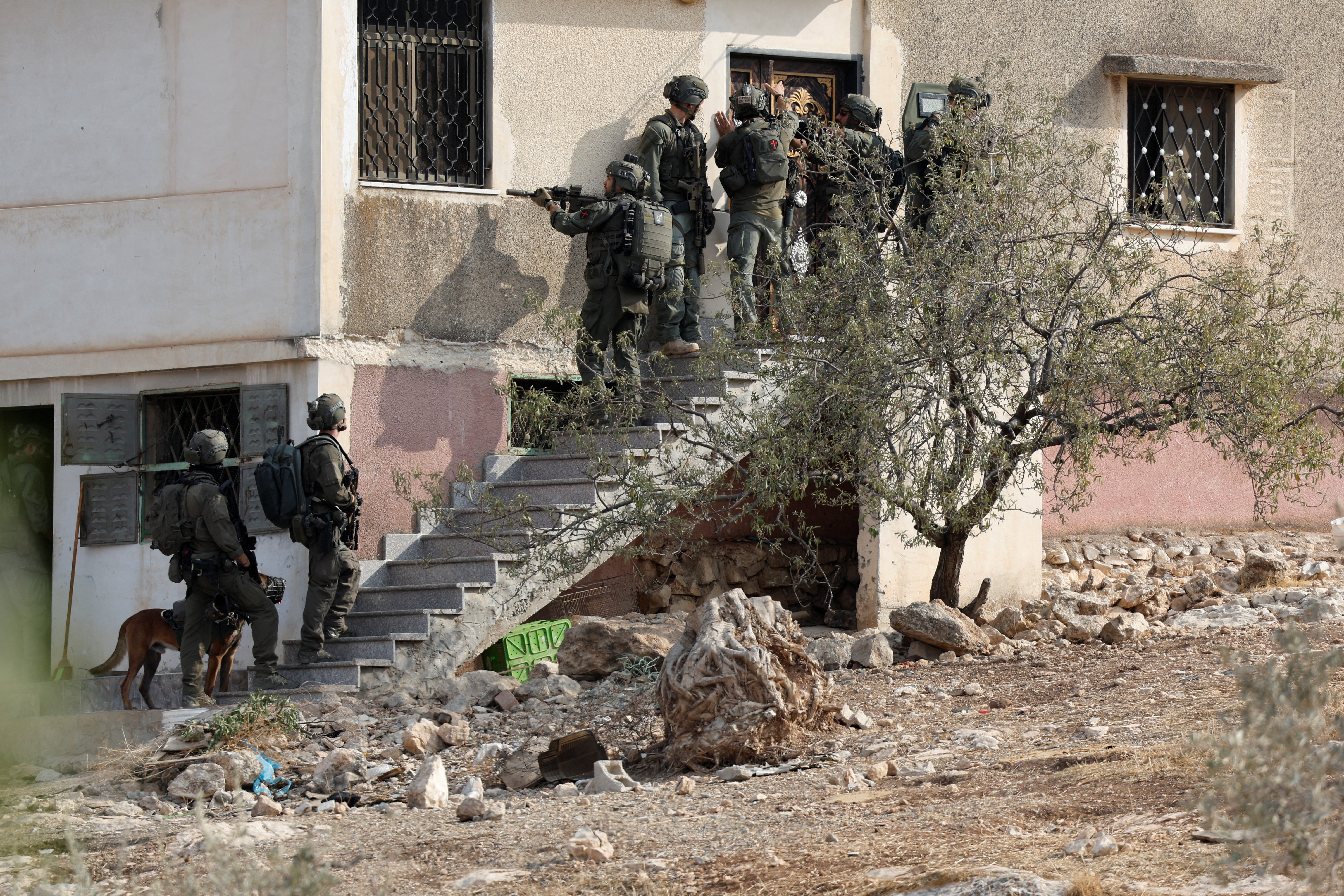 Soldiers operate during an Israeli raid in Tammun near Tubas in the occupied West Bank