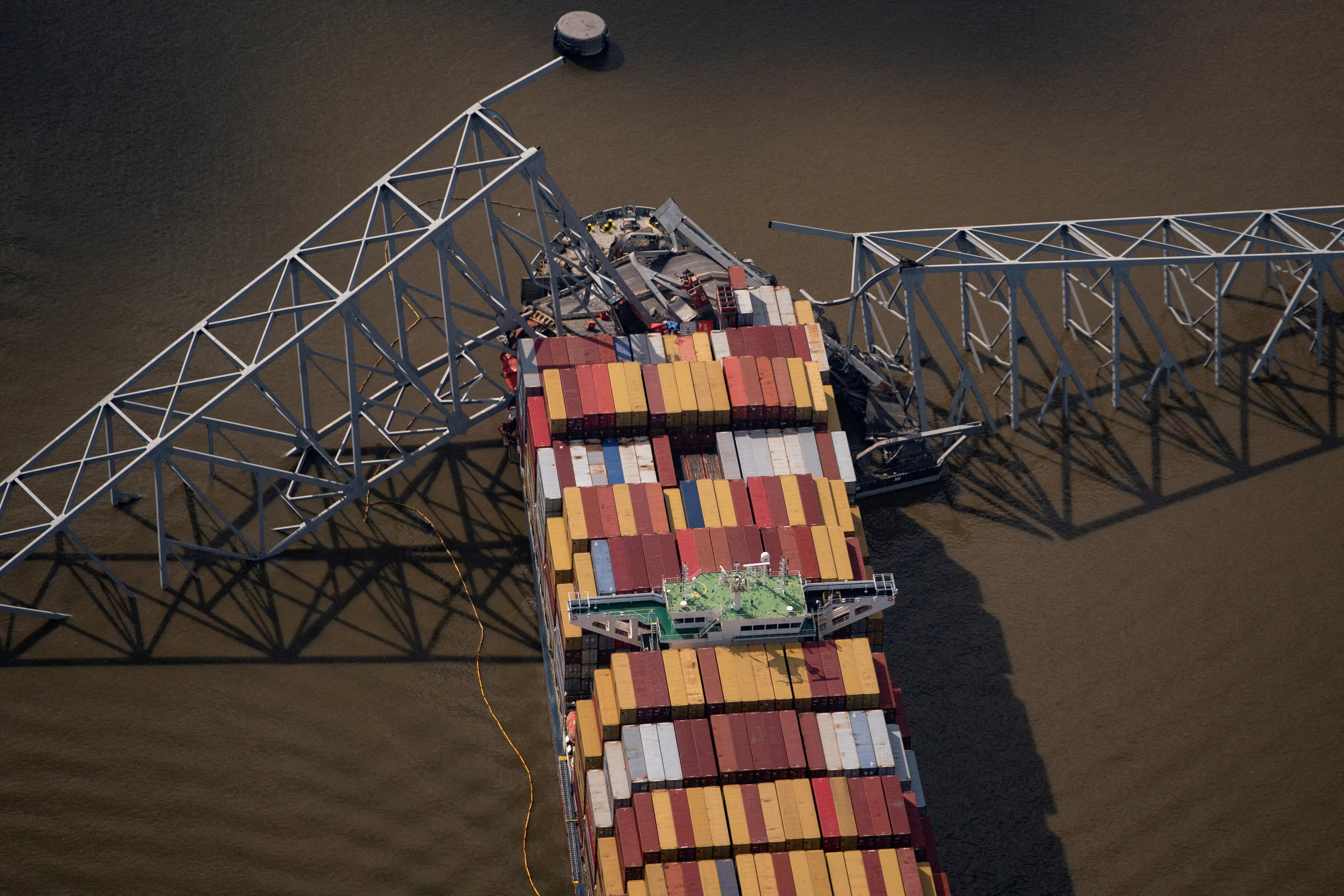 The Dali cargo vessel crashed into the Francis Scott Key Bridge, causing it to collapse in Baltimore, Maryland, on April 4, 2024 [Nathan Howard/Reuters]