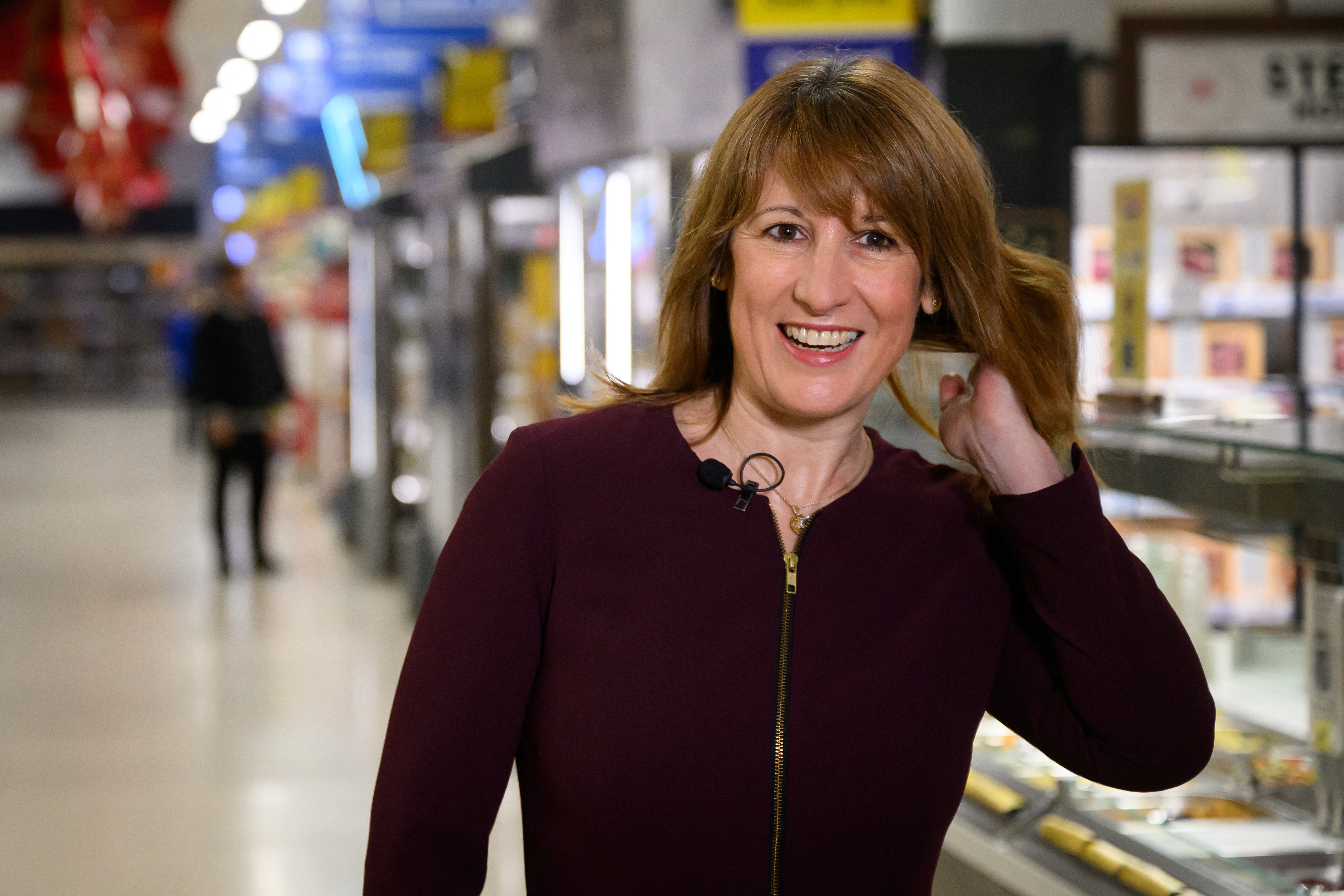 Chancellor of the Exchequer Rachel Reeves prepares to speak to the press during a visit to a branch of the Tesco supermarket chain in London, Britain, November 19, 2025 Leon Neal/Pool via REUTERS