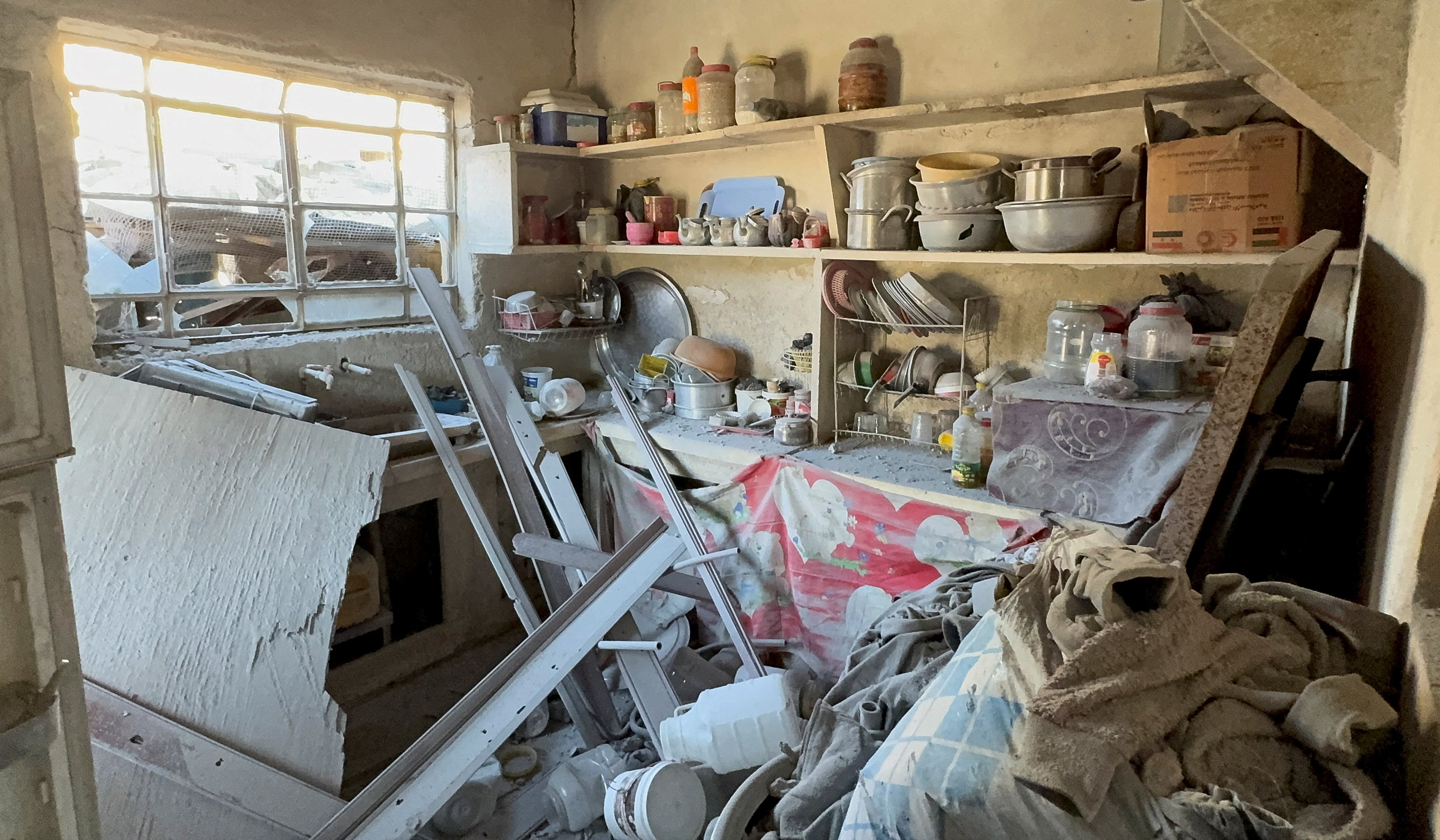 A damaged kitchen following an Israeli raid in Beit Jinn, Syria