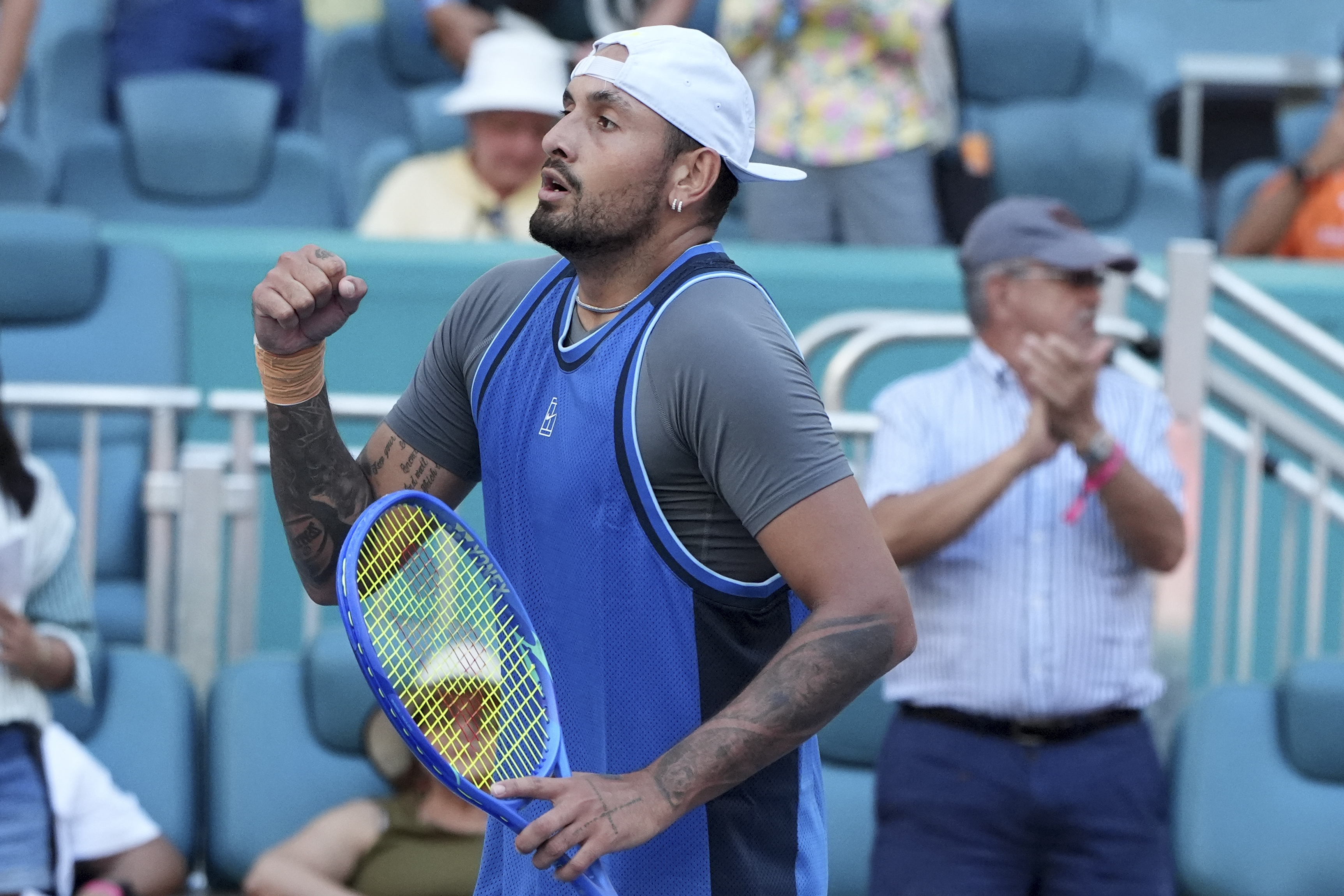 Nick Kyrgios reacts.