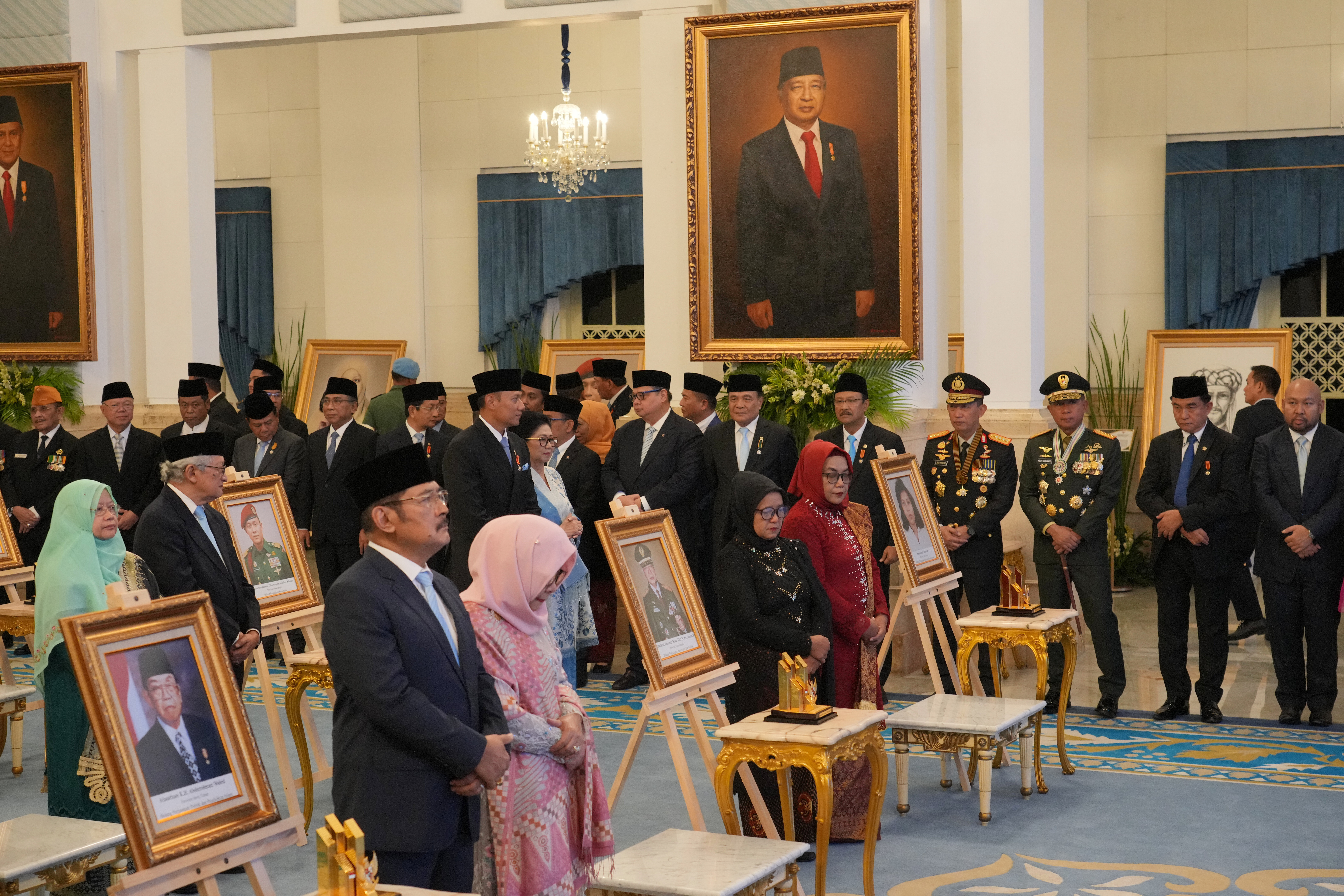 A large portrait of the late President Suharto hangs on the wall of the State Palace during a ceremony awarding national hero titles to 10 figures including the former strongman, in Jakarta, Indonesia on November 10, 2025.