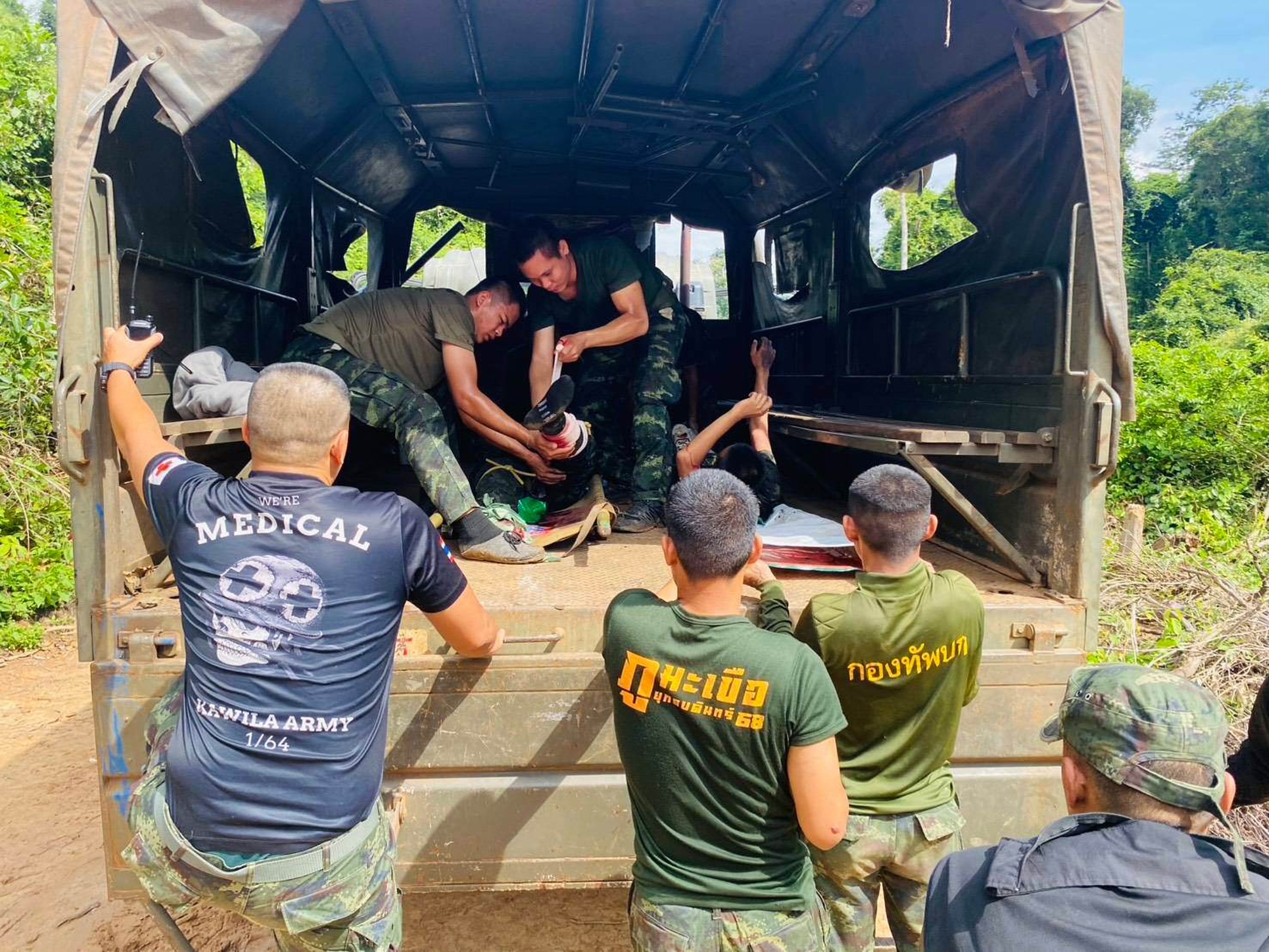 Two Thai soldiers injured by a landmine during a patrol near the Thai-Cambodia border are treated before they are transferred to a hospital in Sisaket province, Thailand on November 10, 2025.